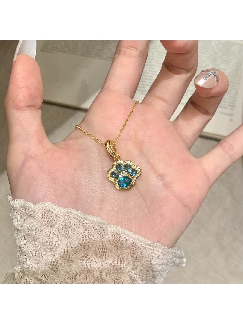 Golden Paw Print Pendant Necklace with Blue Gemstones