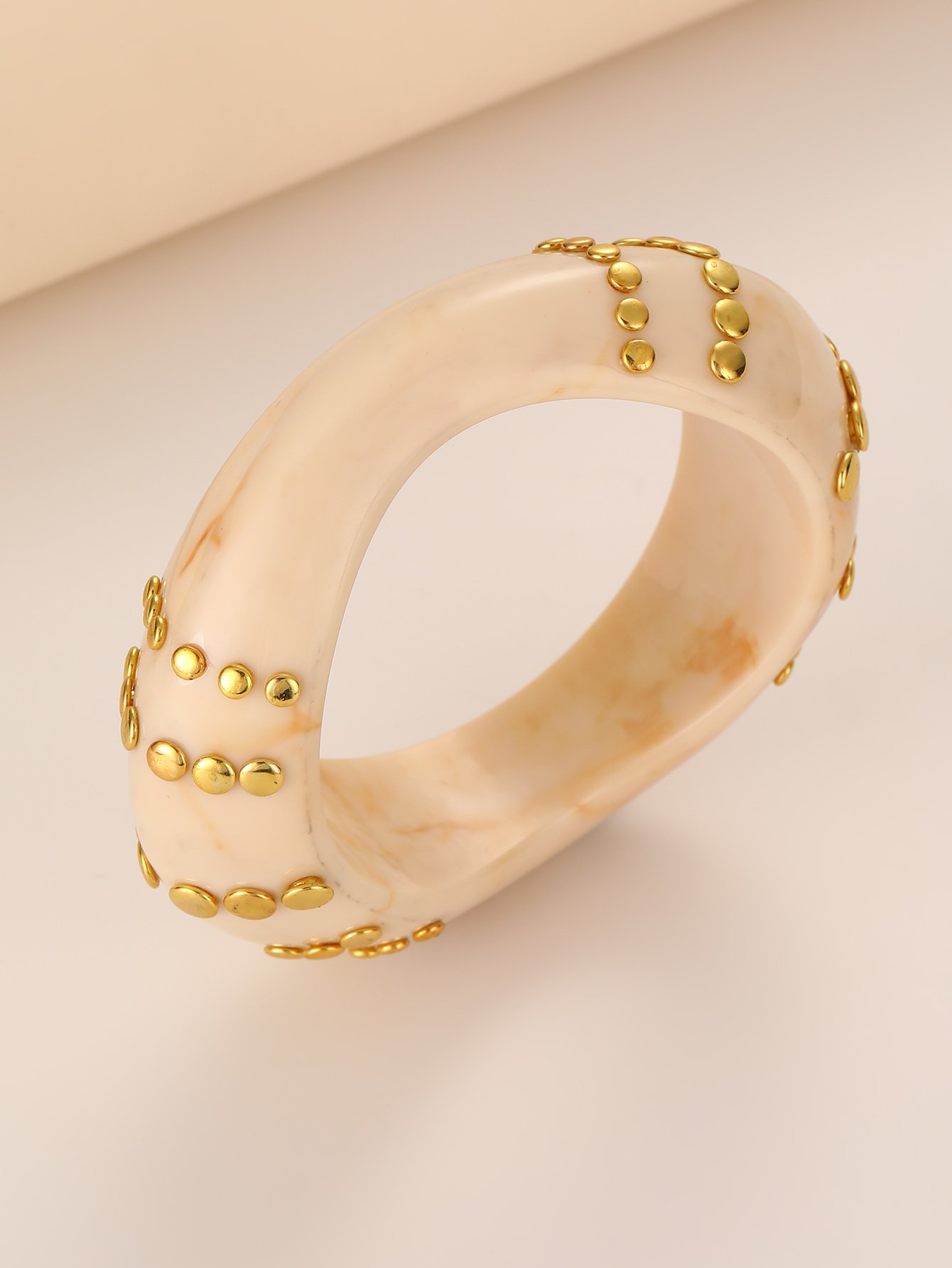 Beige Geometric Bangle with Gold Studs