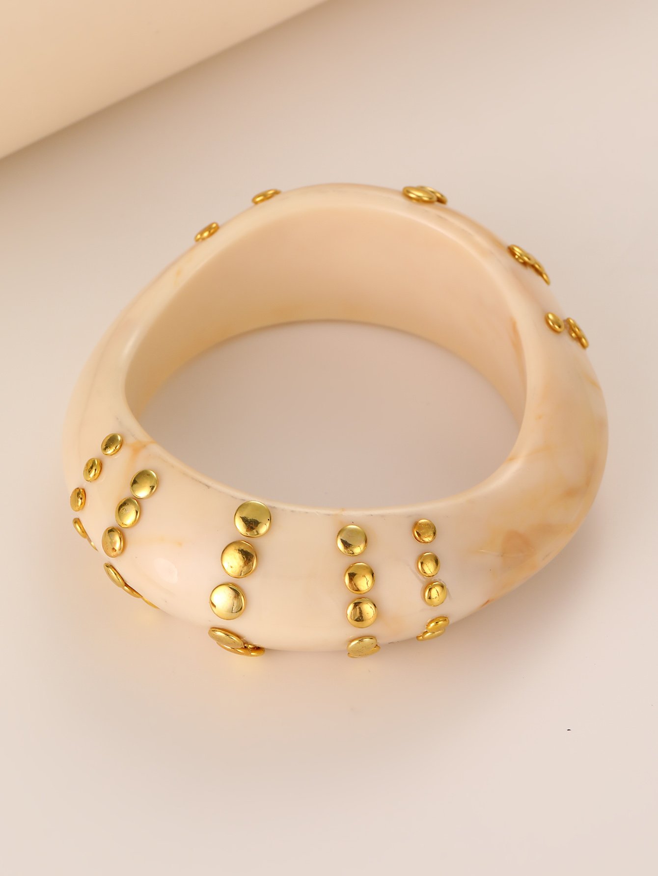 Beige Geometric Bangle with Gold Studs