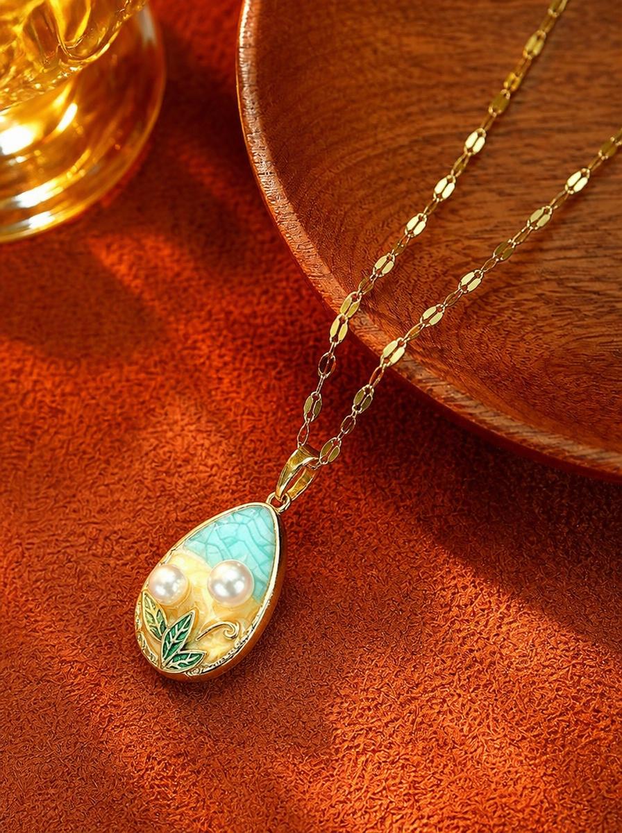 Golden Serenity Teardrop Necklace with Pearls
