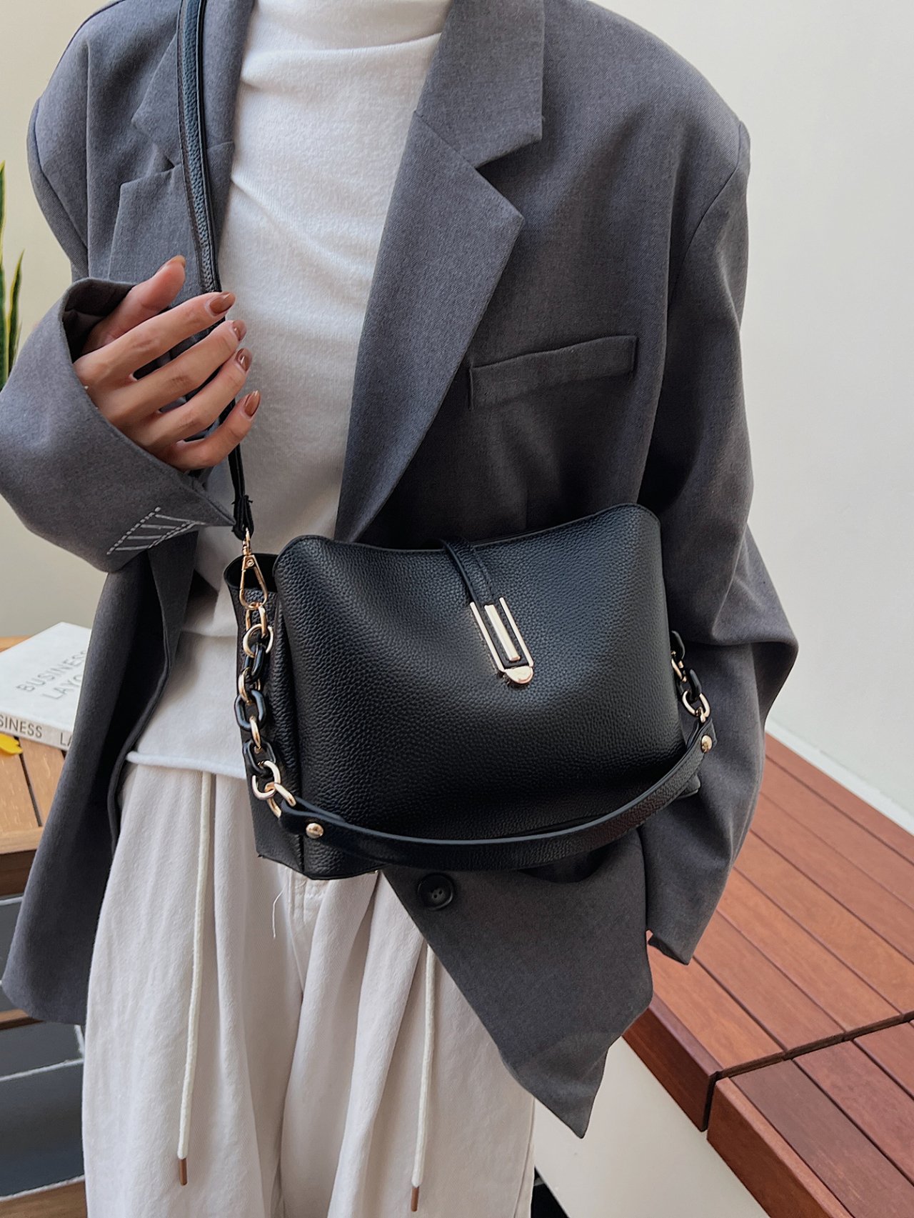 Black Leather Crossbody Bag with Gold Hardware