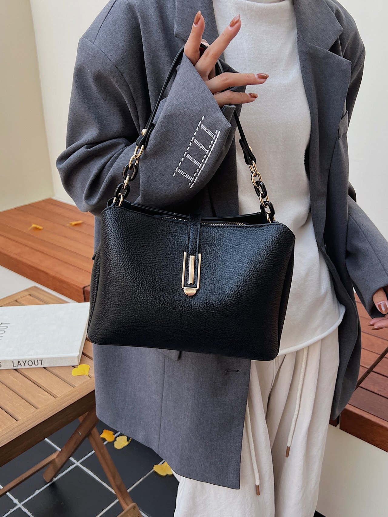 Black Leather Crossbody Bag with Gold Hardware