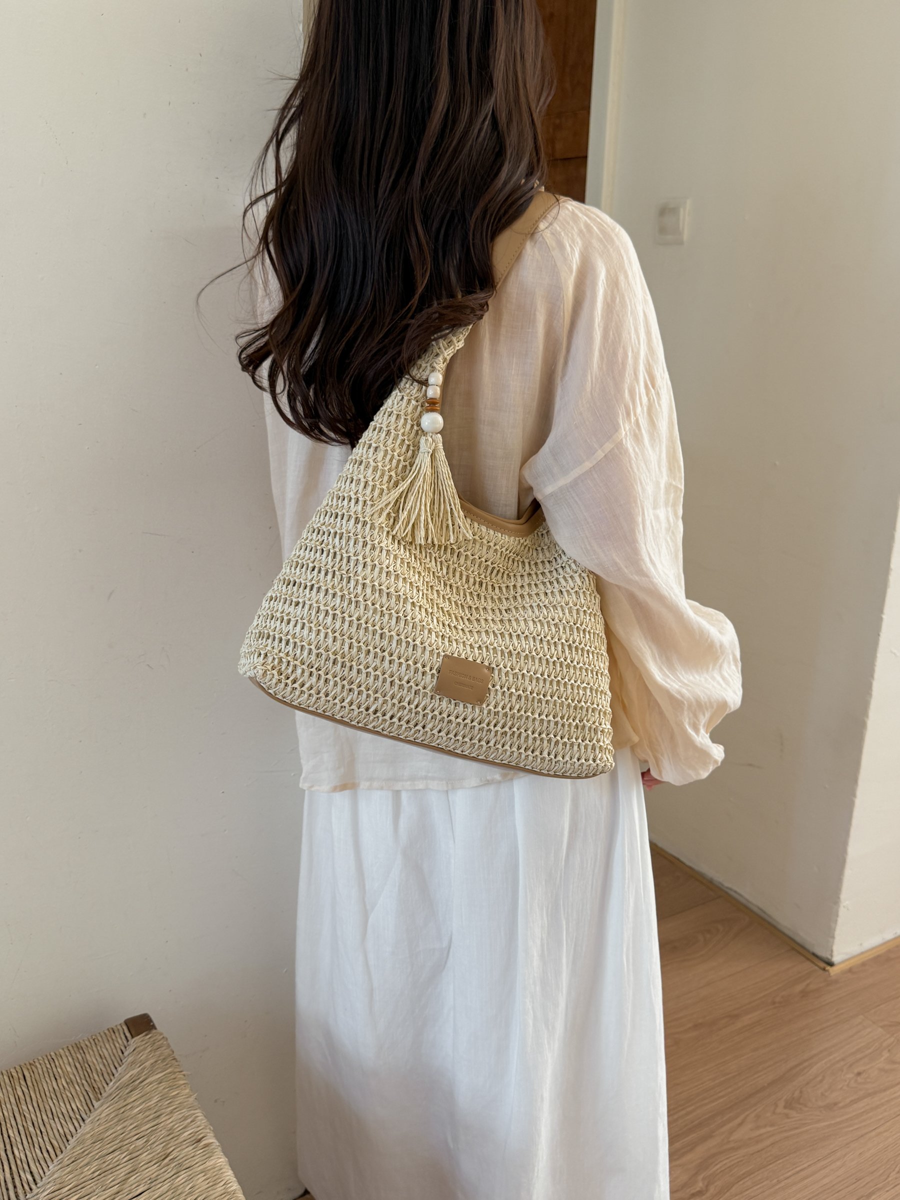 Beige Woven Shoulder Bag with Tassel Accent