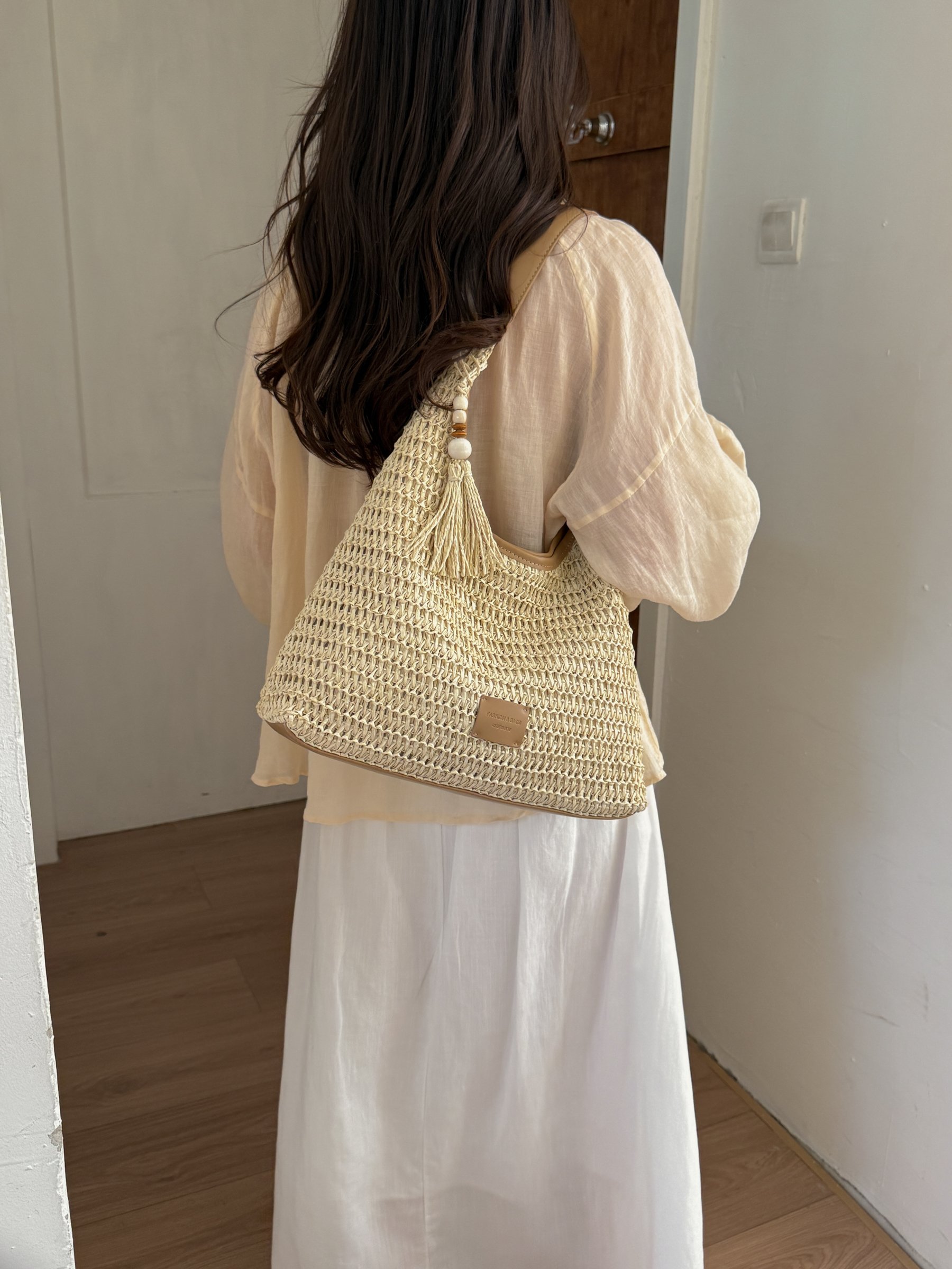 Beige Woven Shoulder Bag with Tassel Accent