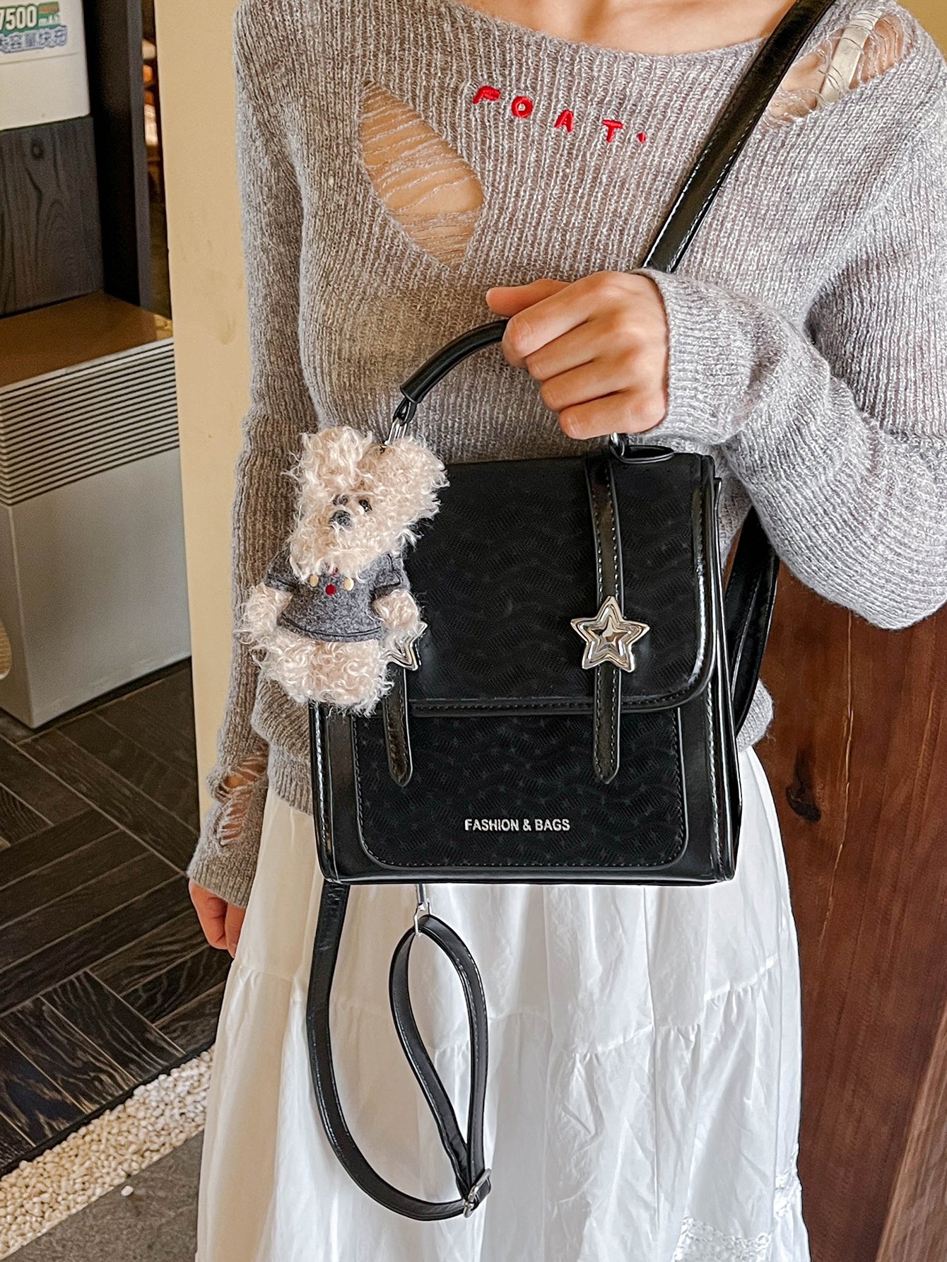 Black Handbag with Star Embellishment