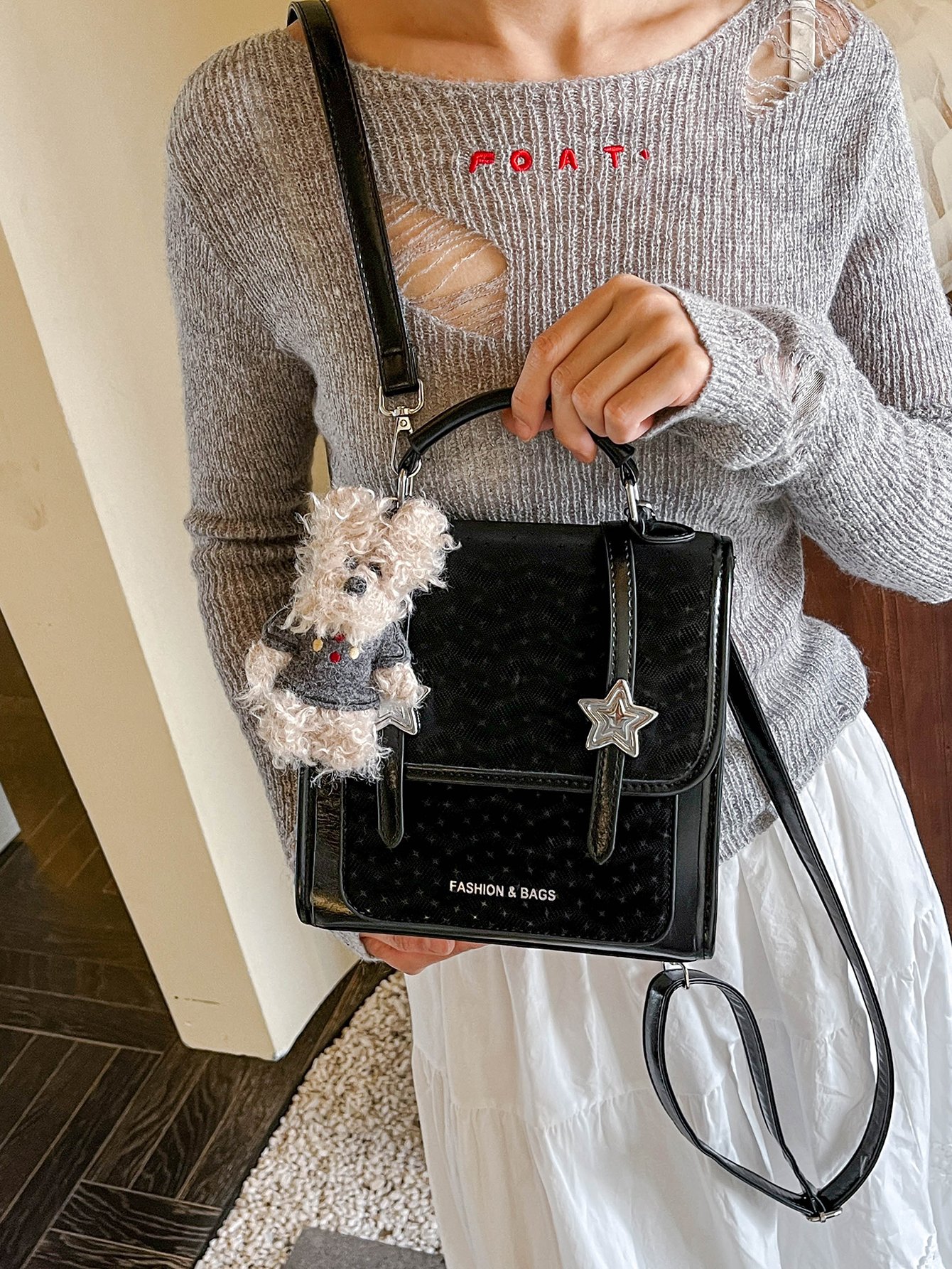 Black Handbag with Star Embellishment