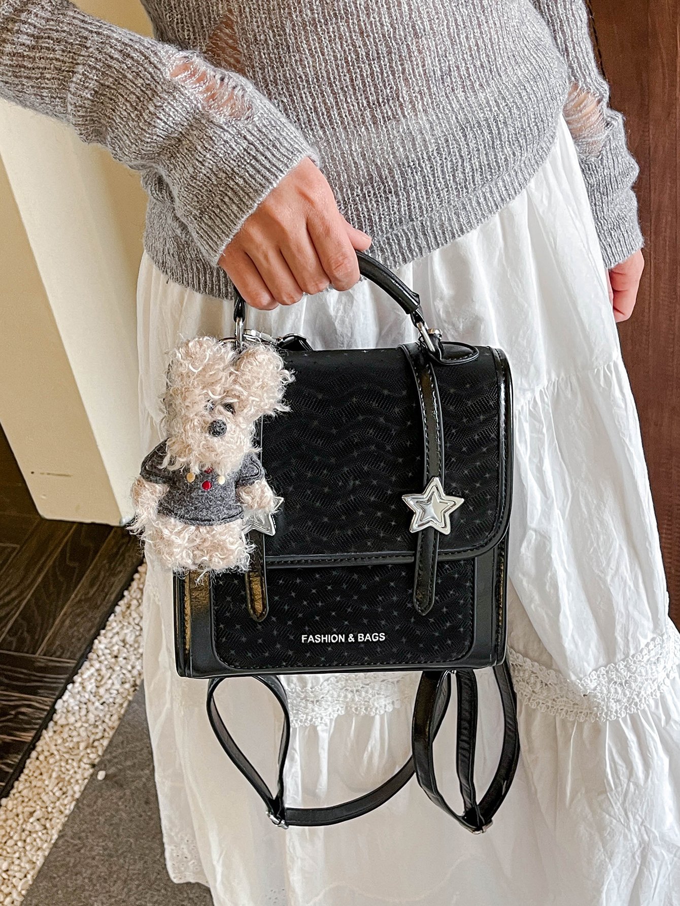 Black Handbag with Star Embellishment