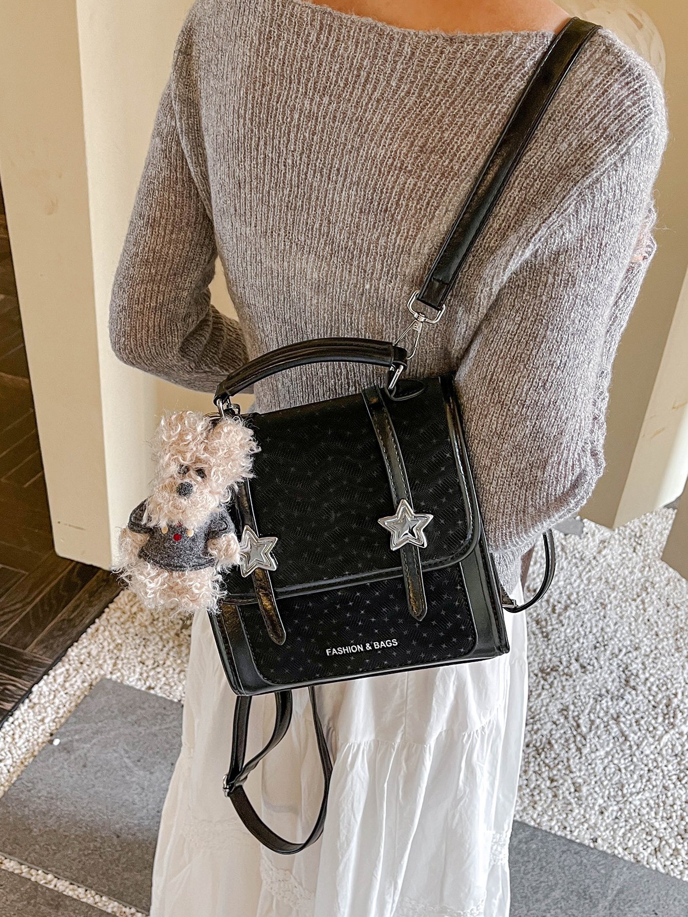 Black Handbag with Star Embellishment
