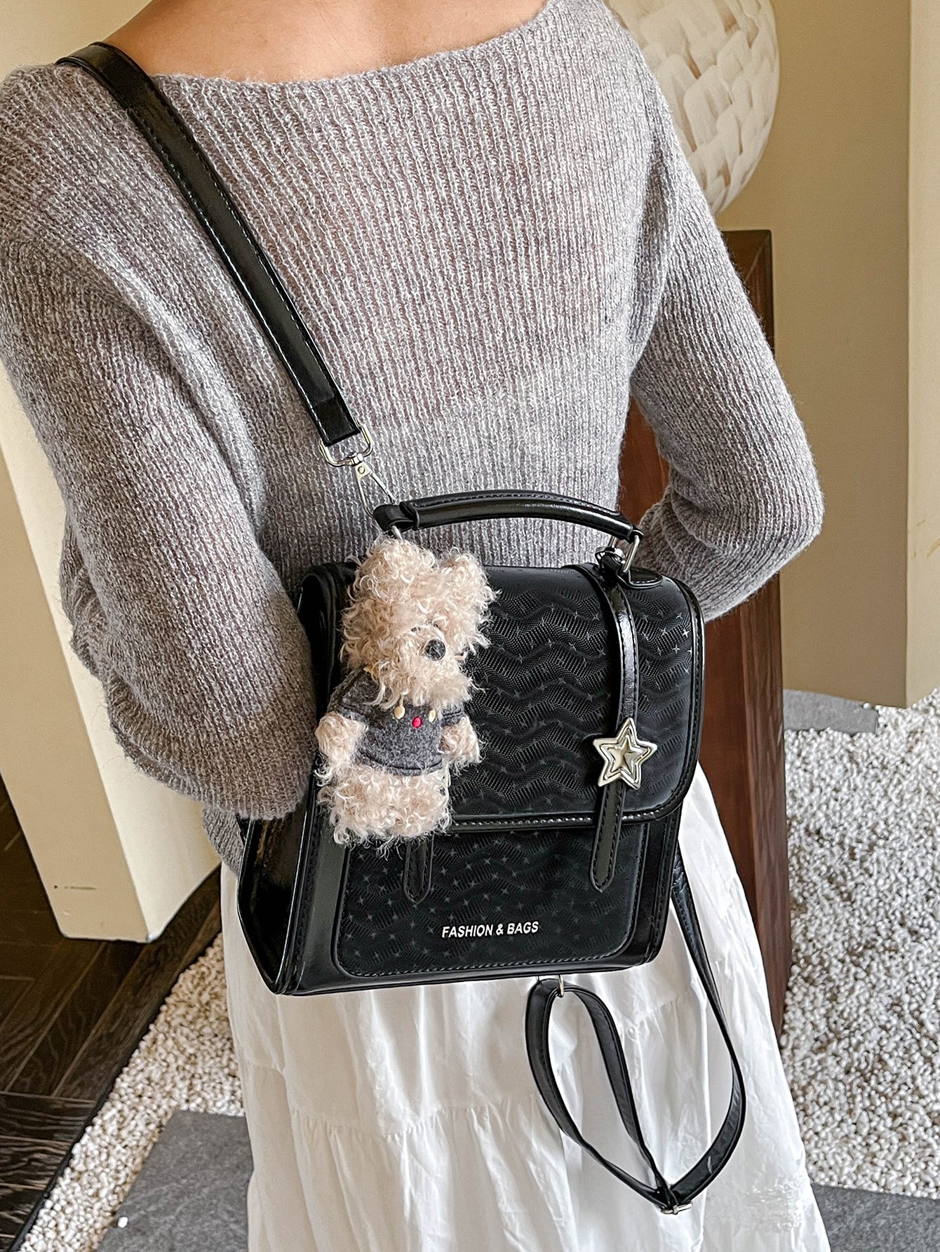 Black Handbag with Star Embellishment
