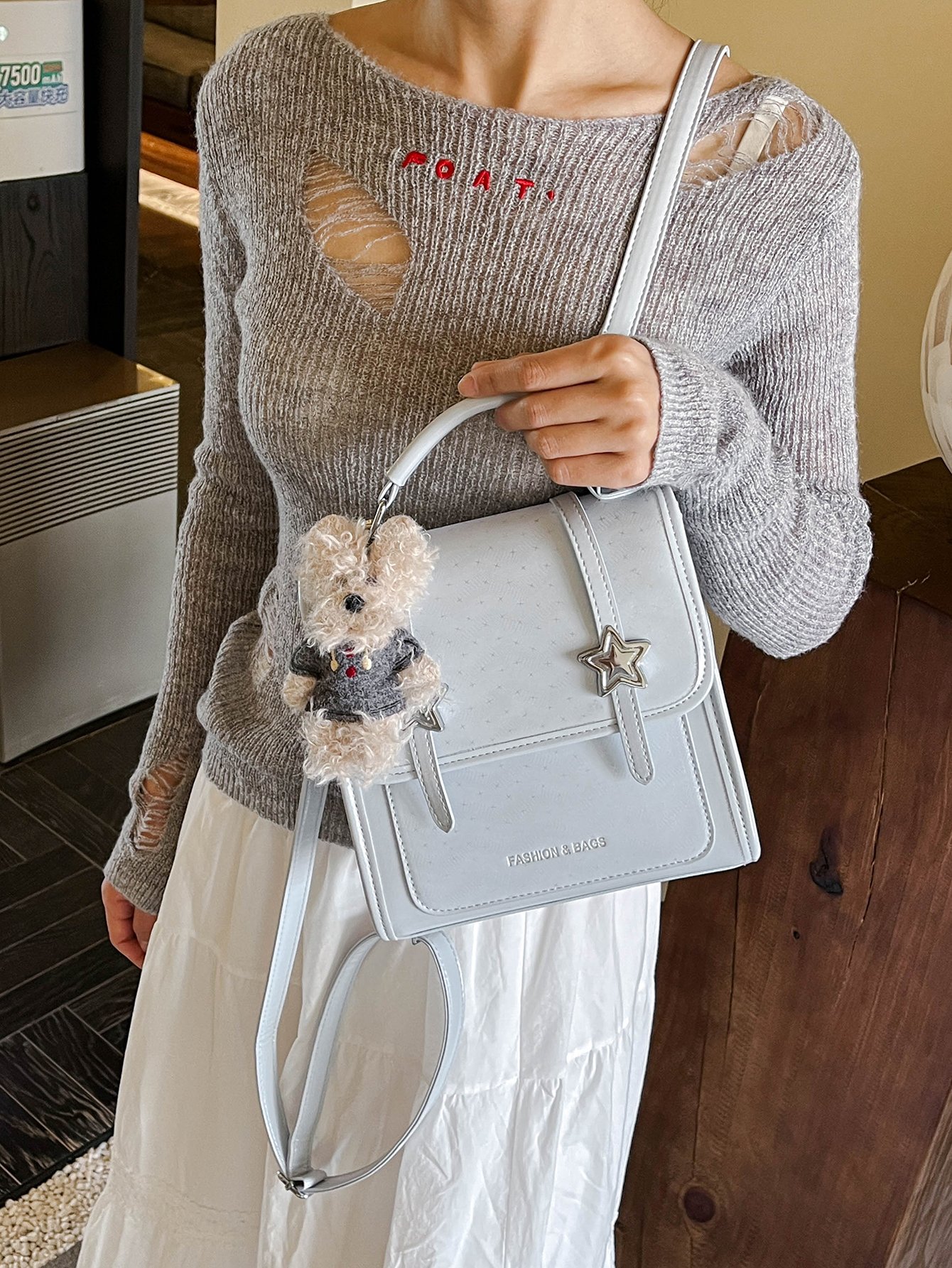 Stylish Blue Crossbody Handbag with Star Accent