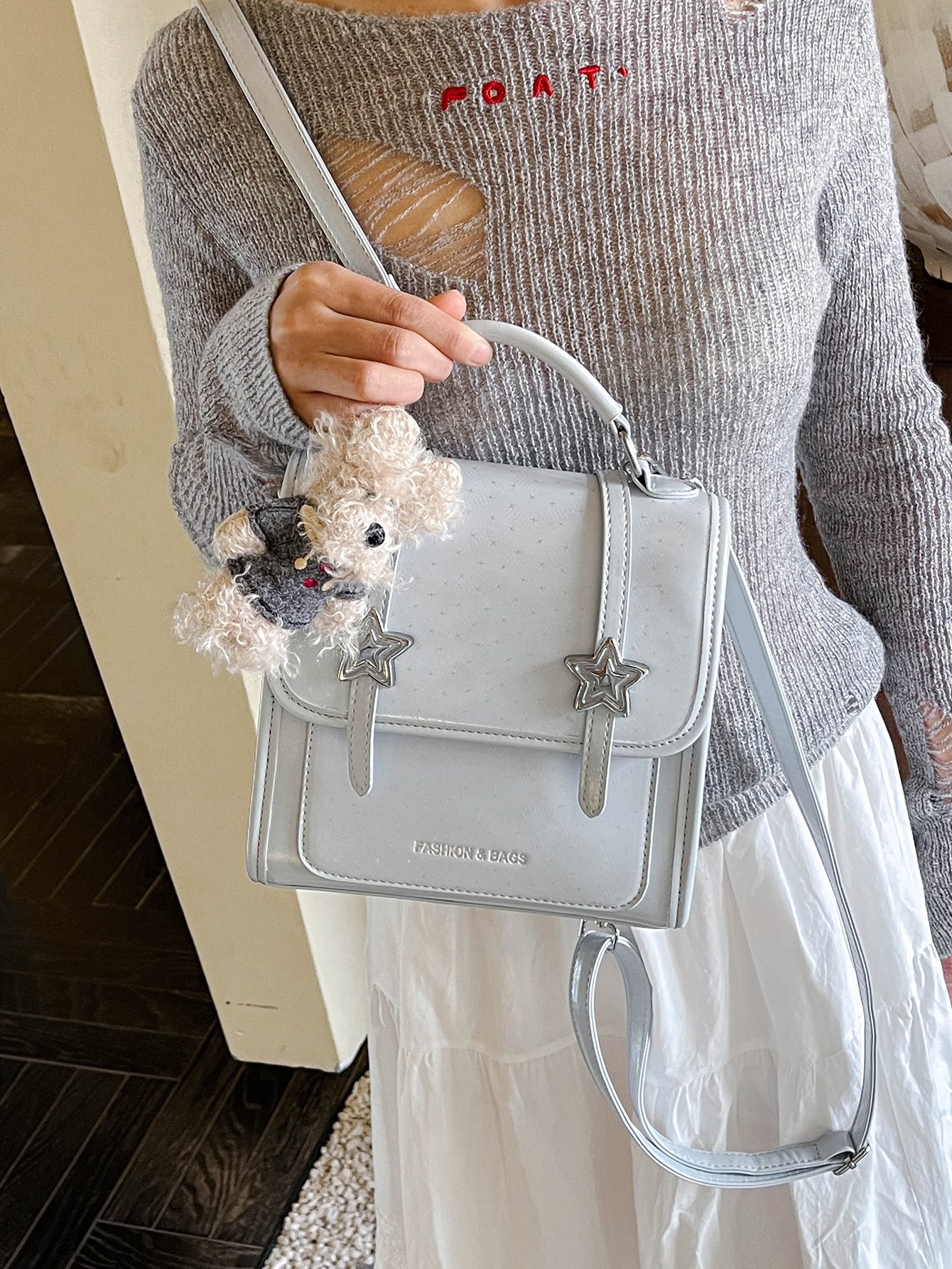 Stylish Blue Crossbody Handbag with Star Accent