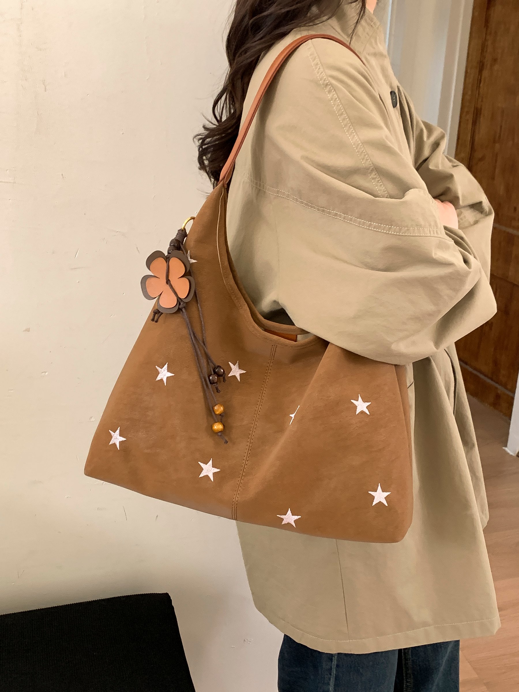 Brown Star-Embellished Shoulder Bag with Floral Charm