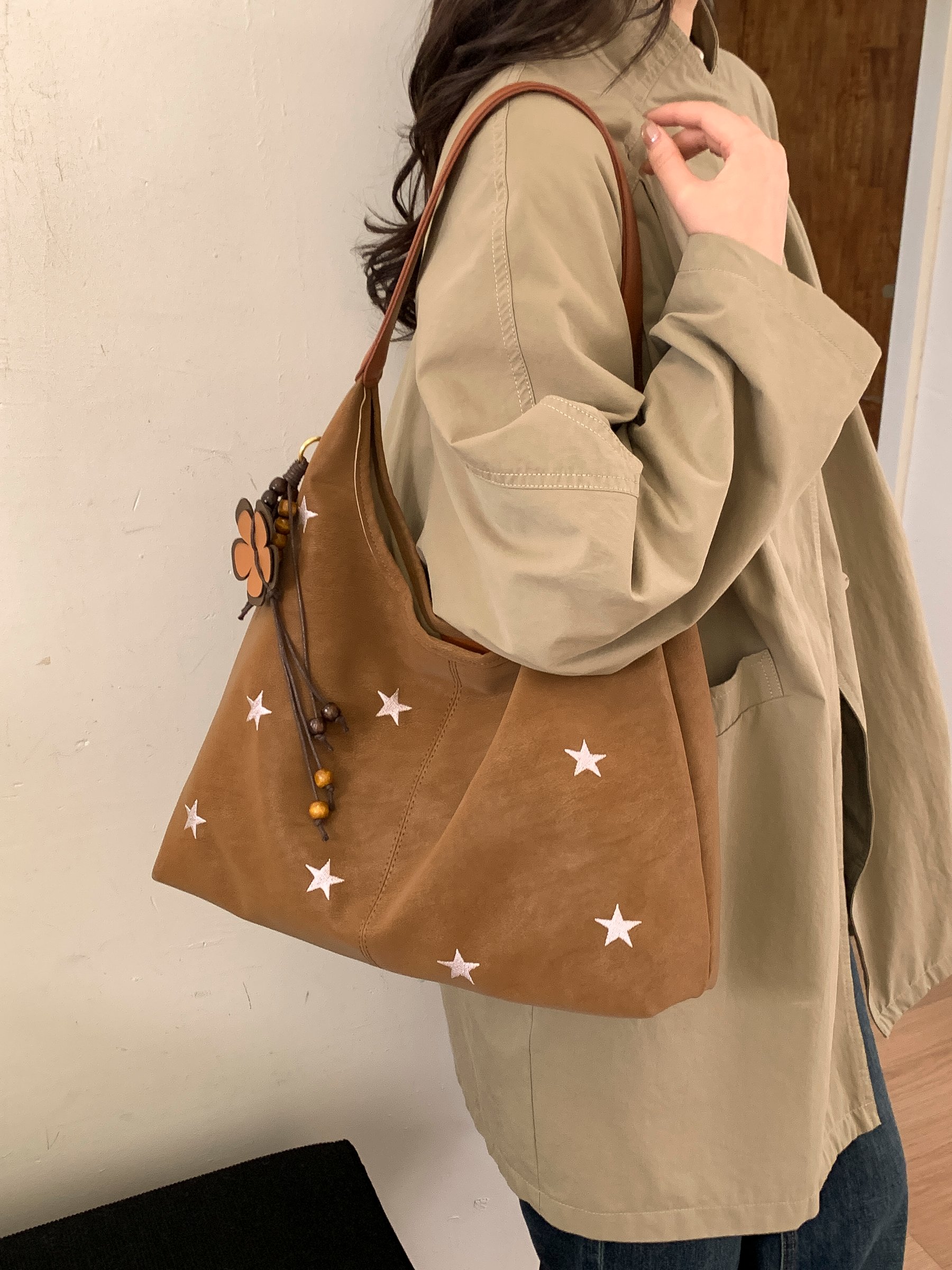 Brown Star-Embellished Shoulder Bag with Floral Charm
