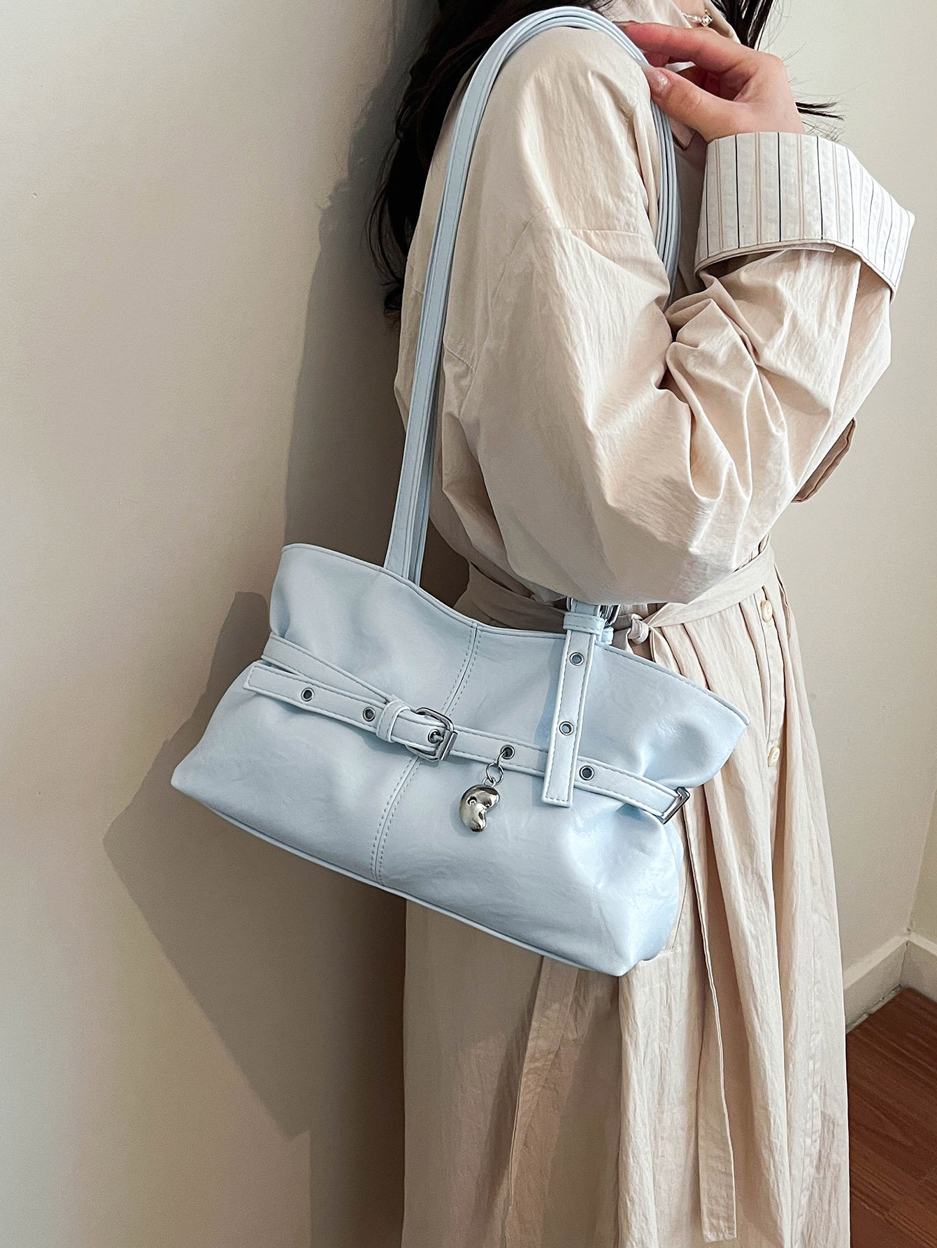 Blue Shoulder Bag with Unique Pendant Detail