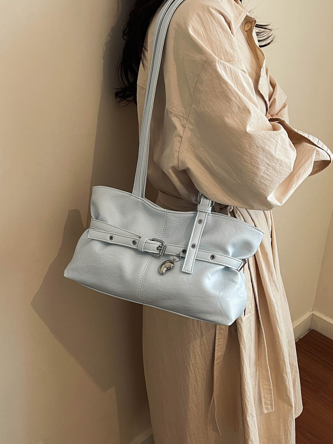 Blue Shoulder Bag with Unique Pendant Detail