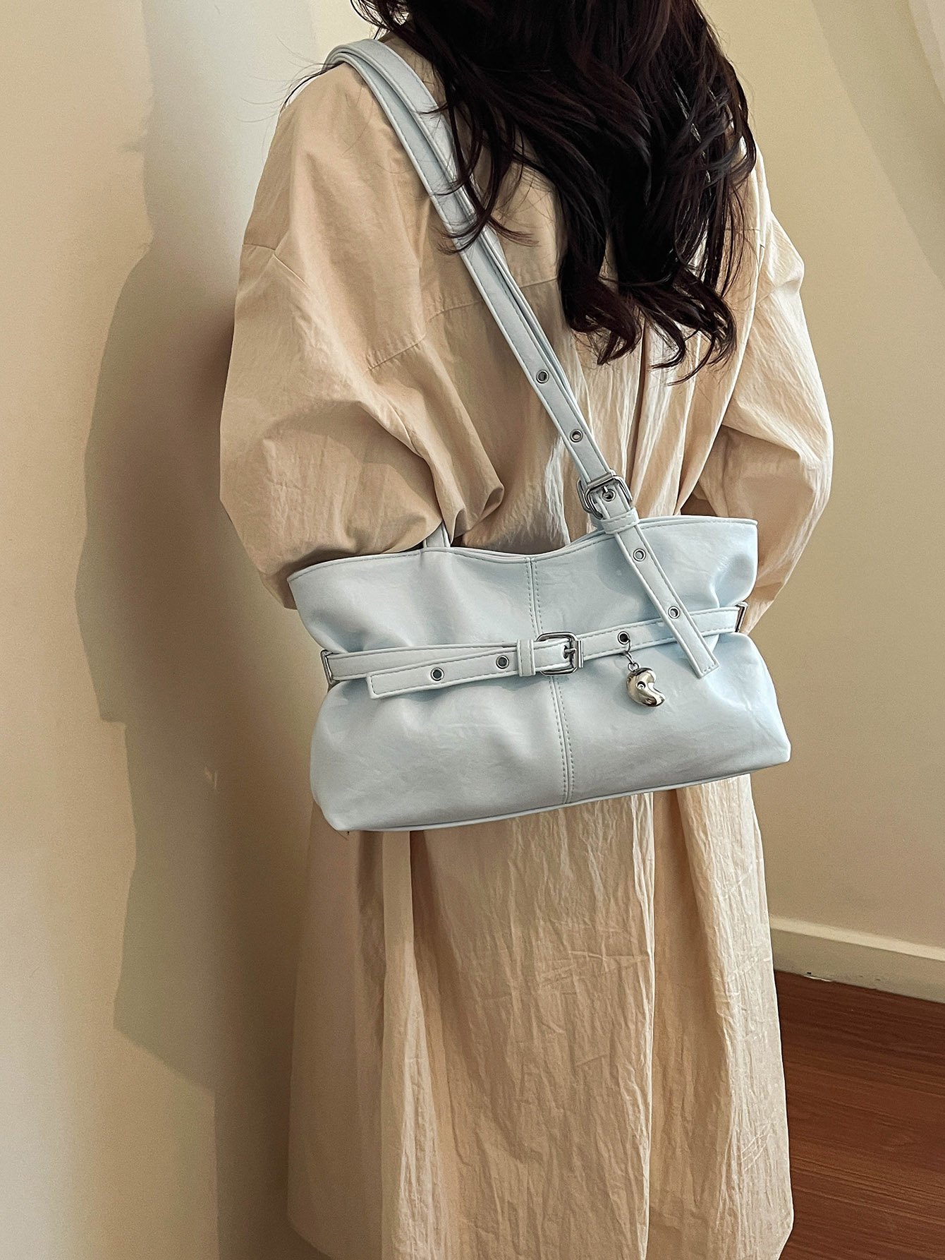 Blue Shoulder Bag with Unique Pendant Detail