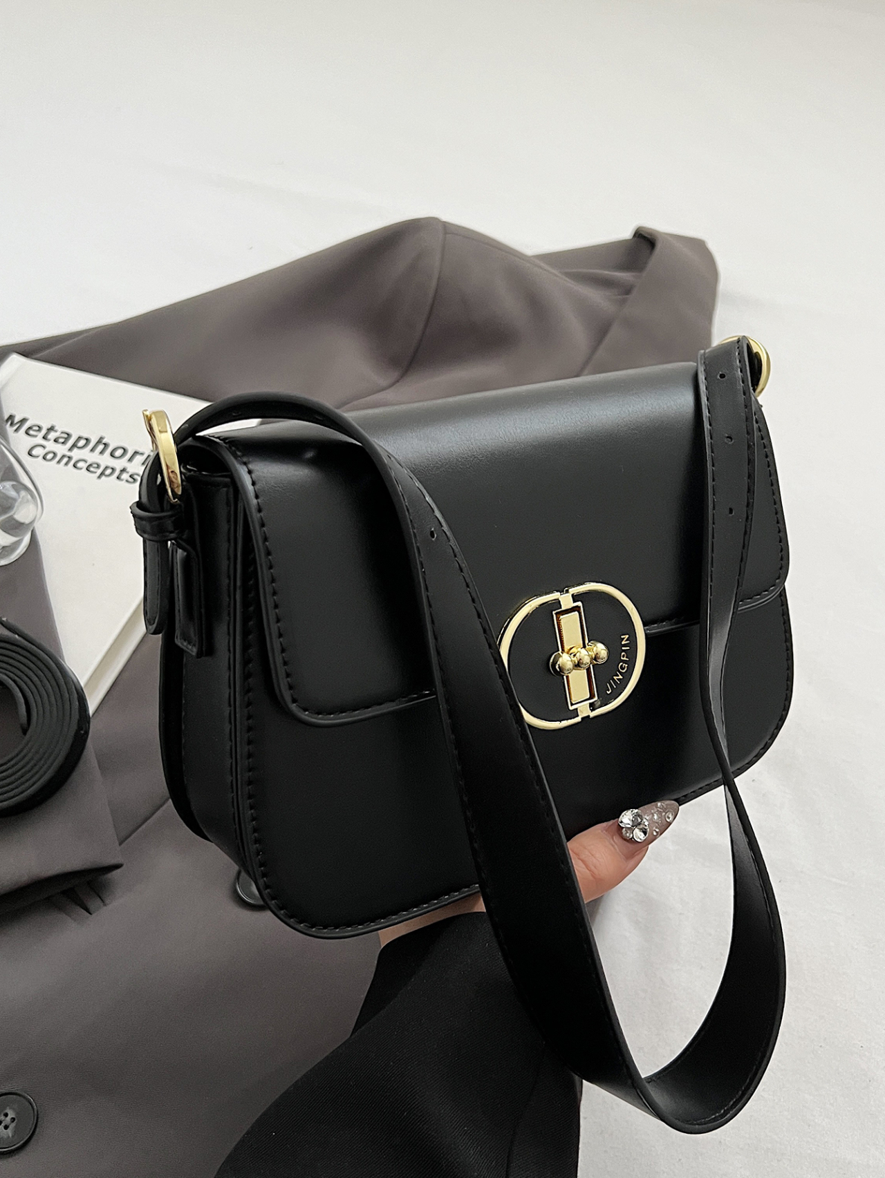 Black Crossbody Bag with Gold Lock Accent