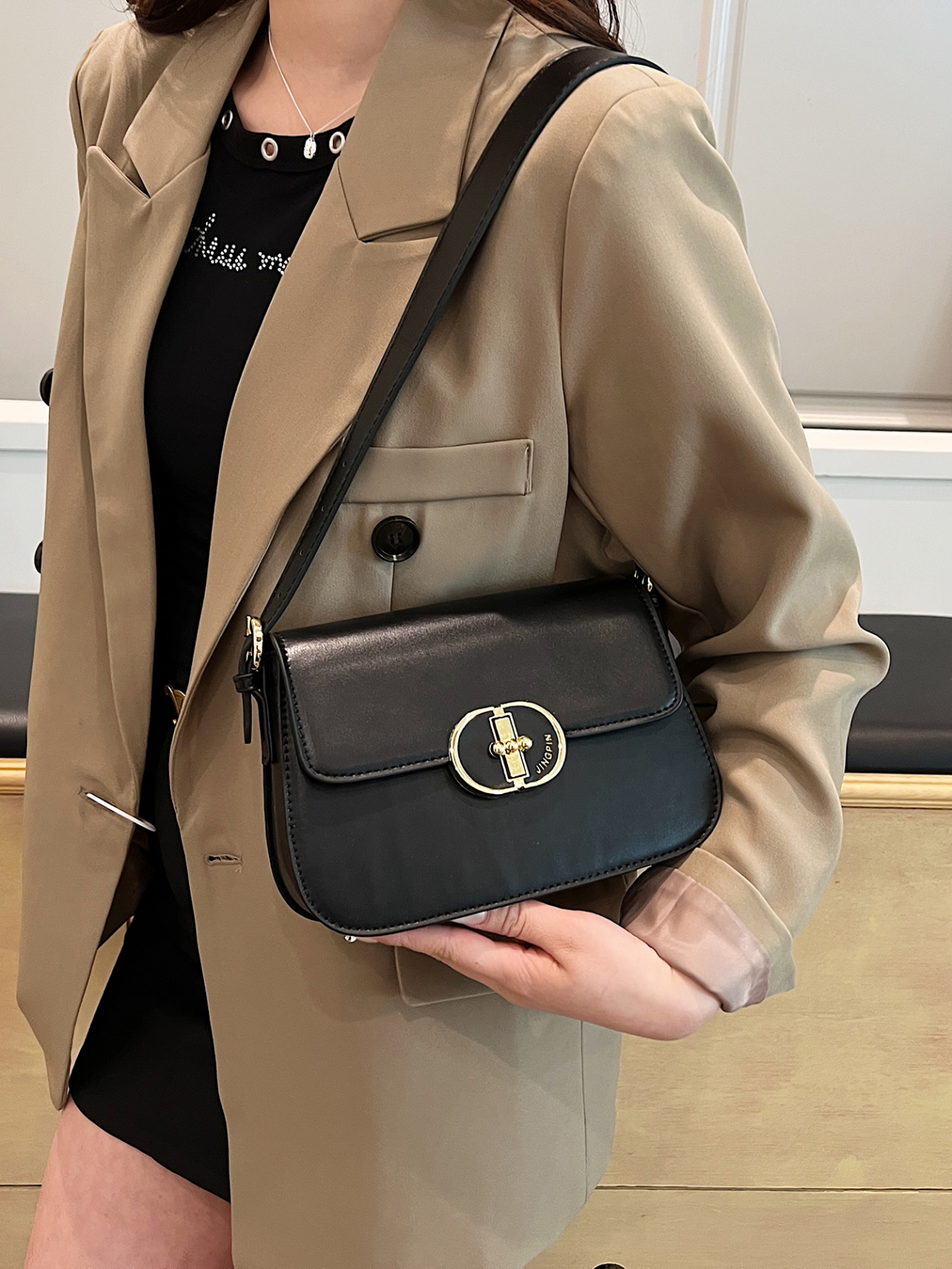 Black Crossbody Bag with Gold Lock Accent