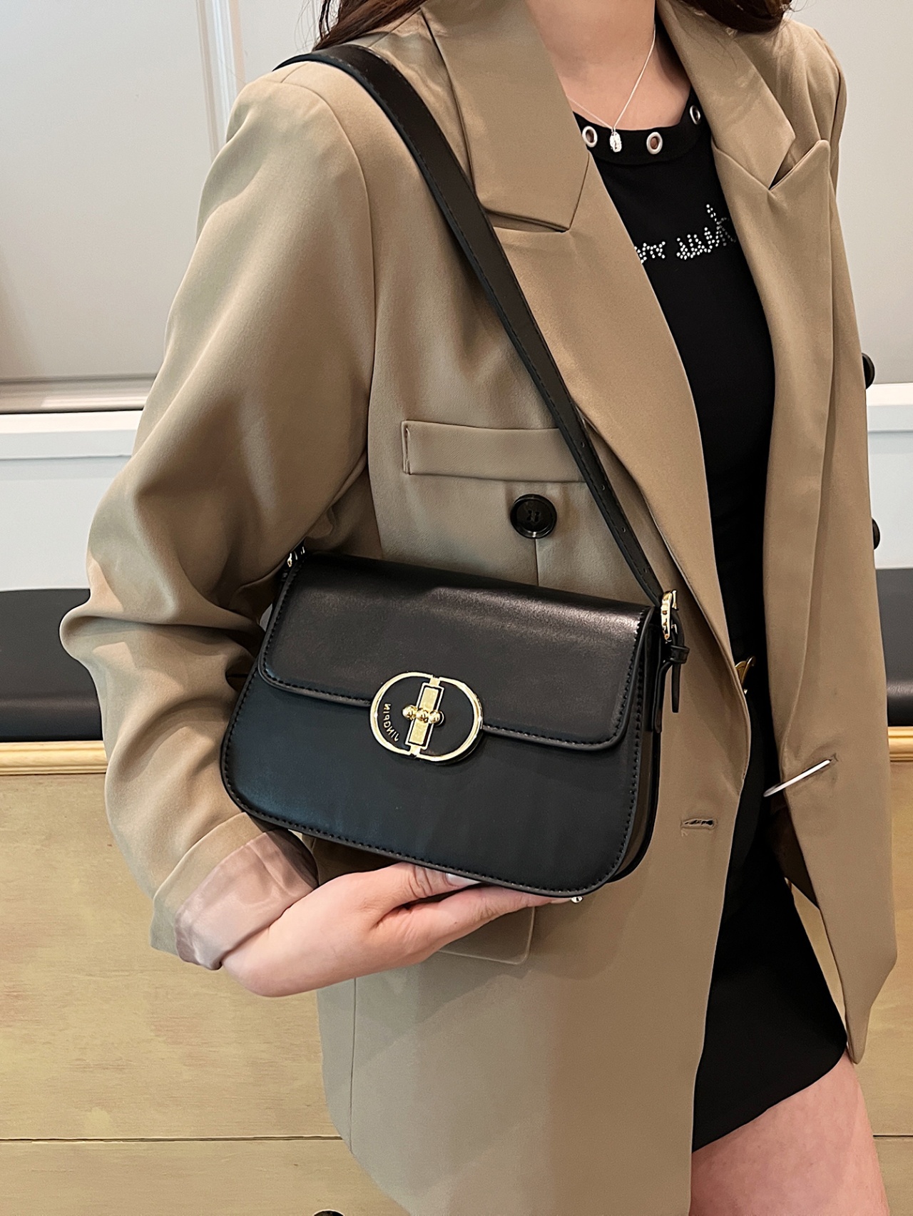 Black Crossbody Bag with Gold Lock Accent