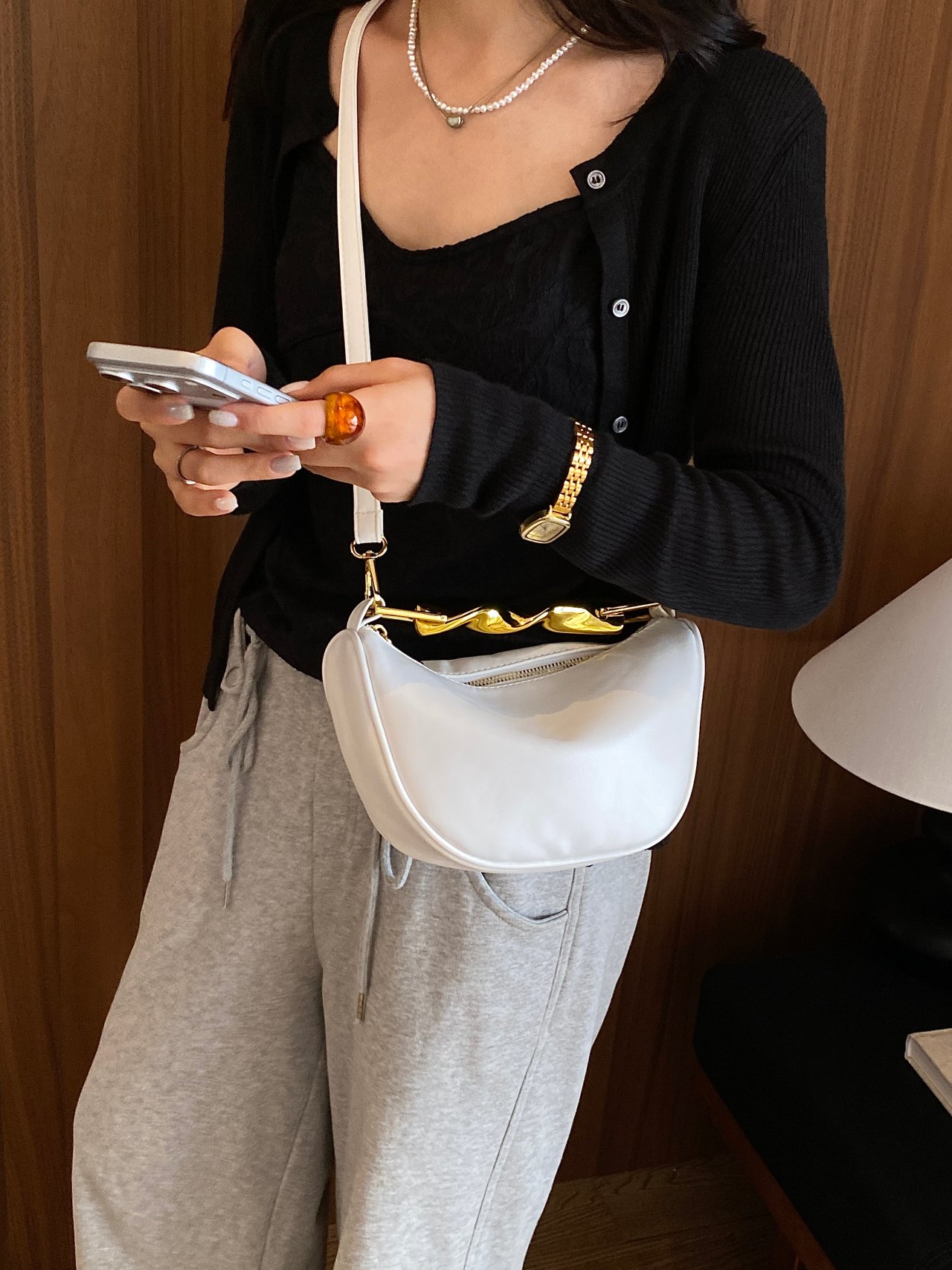 White Crossbody Bag with Gold Chain Detail