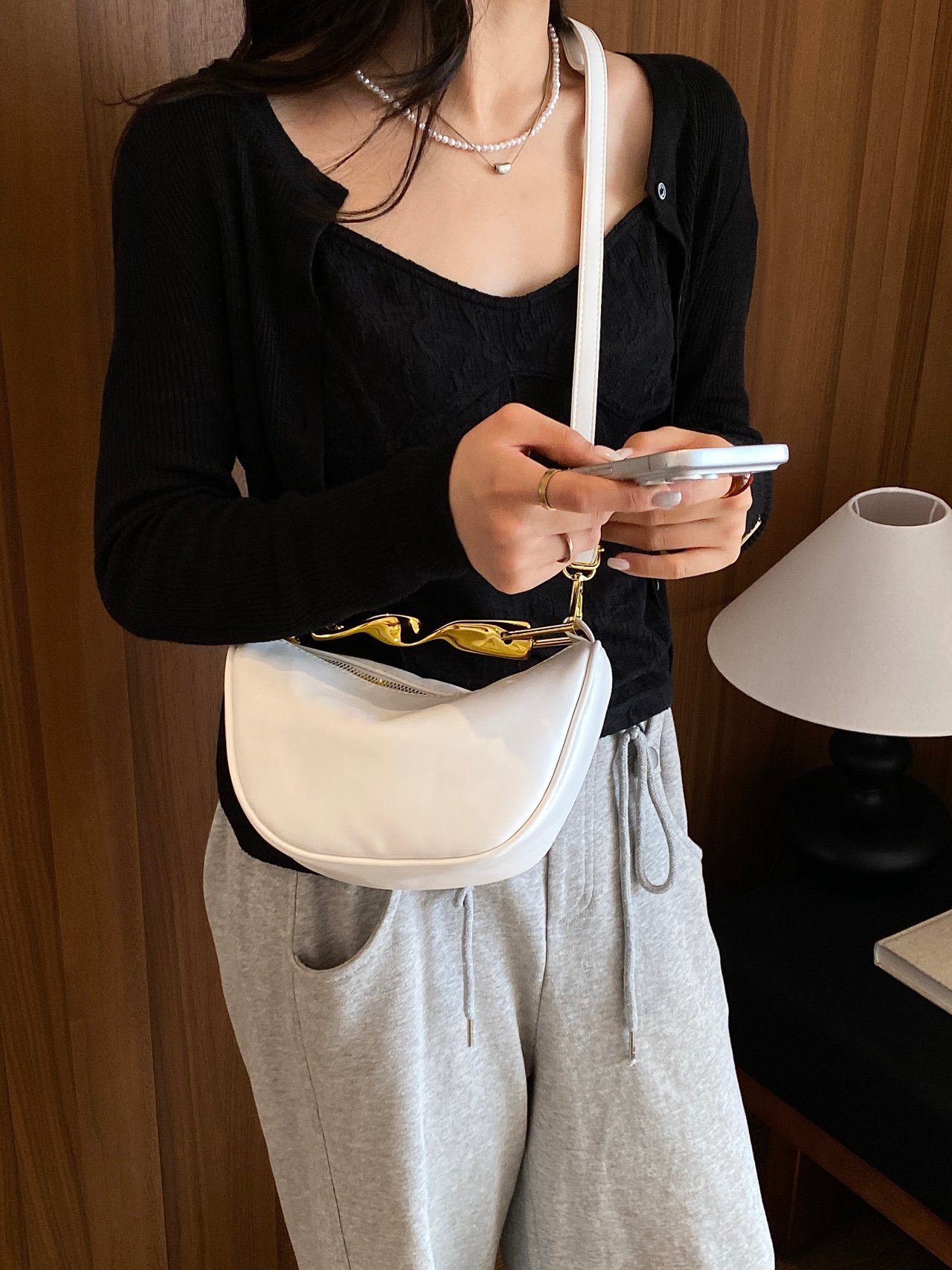 White Crossbody Bag with Gold Chain Detail