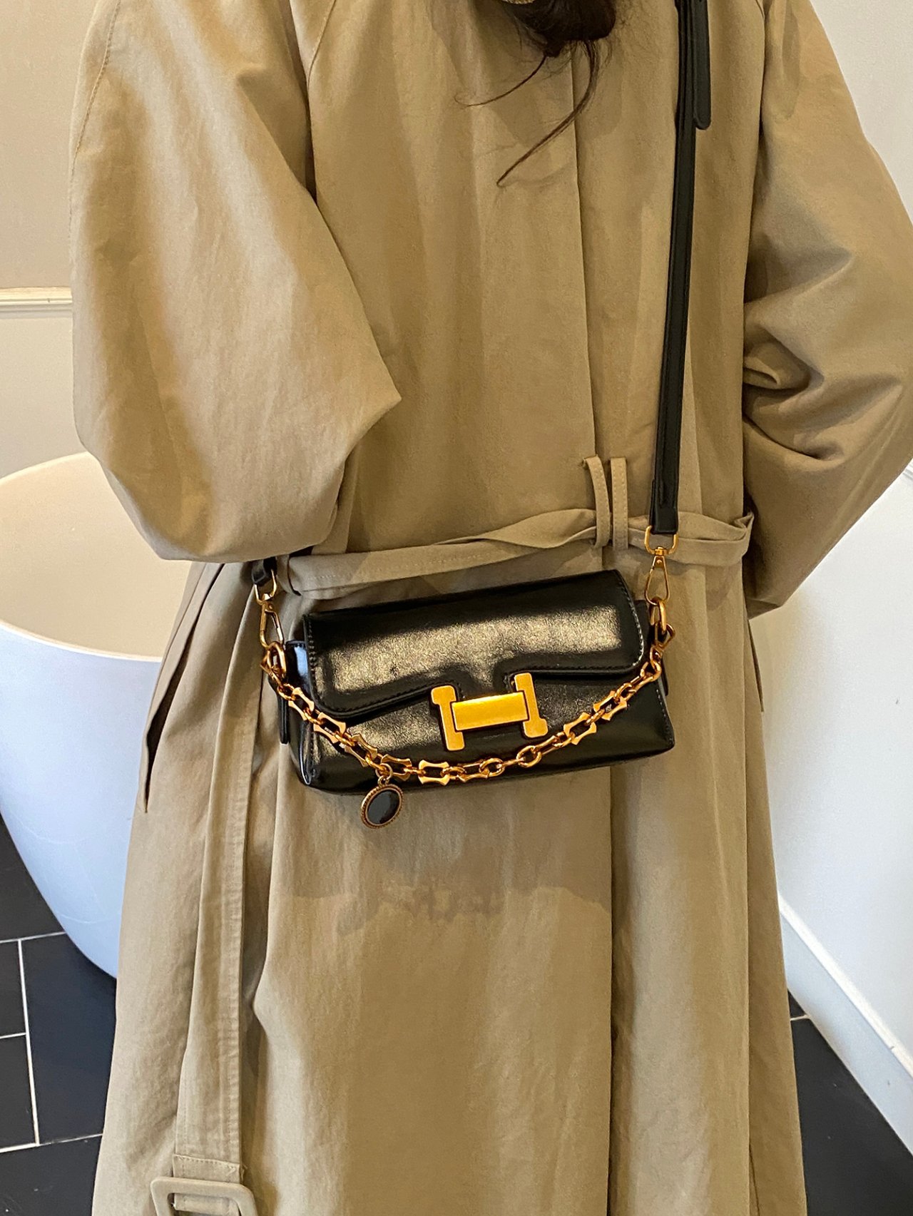 Black Crossbody Bag with Gold Chain Detail
