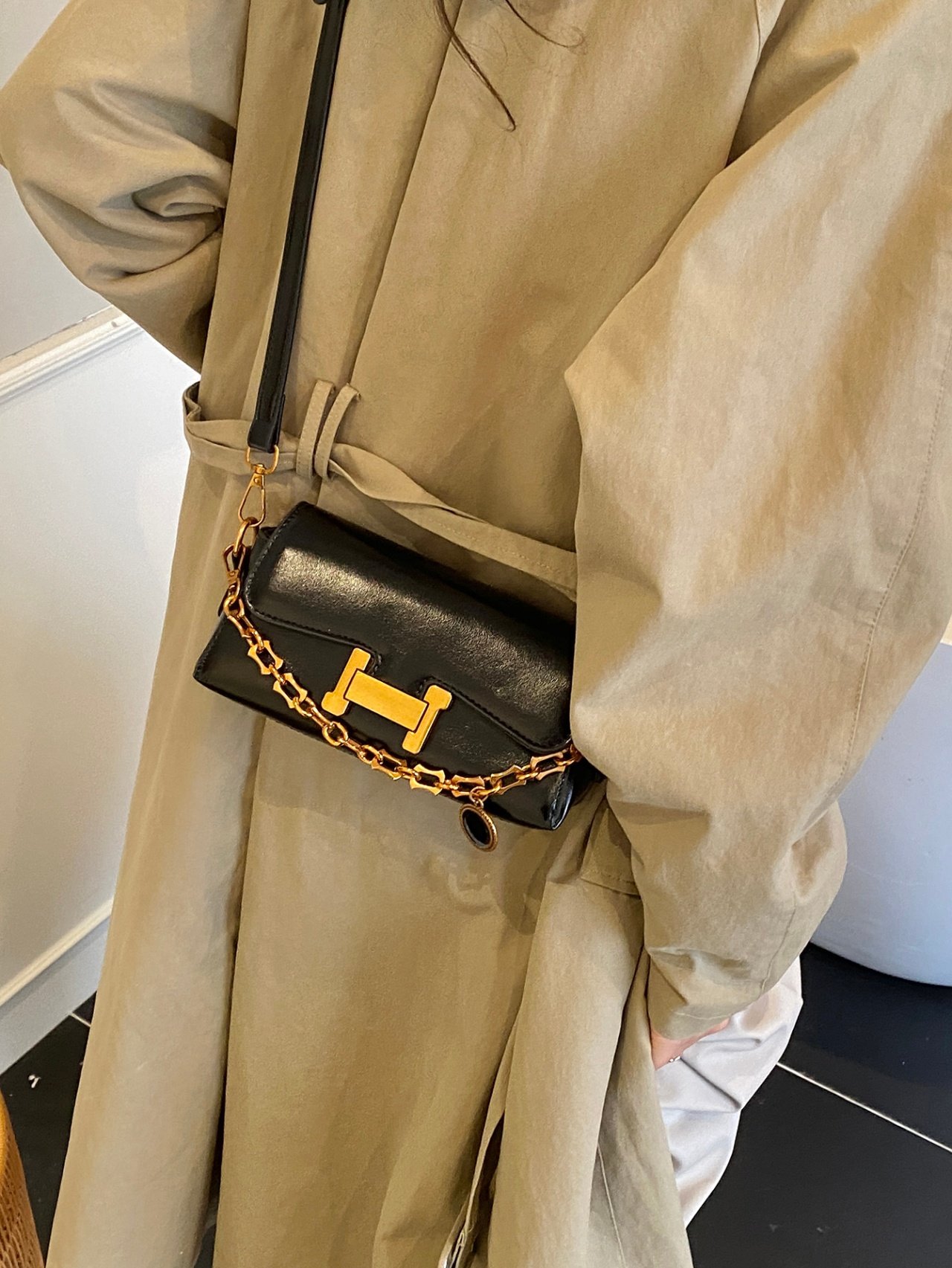 Black Crossbody Bag with Gold Chain Detail