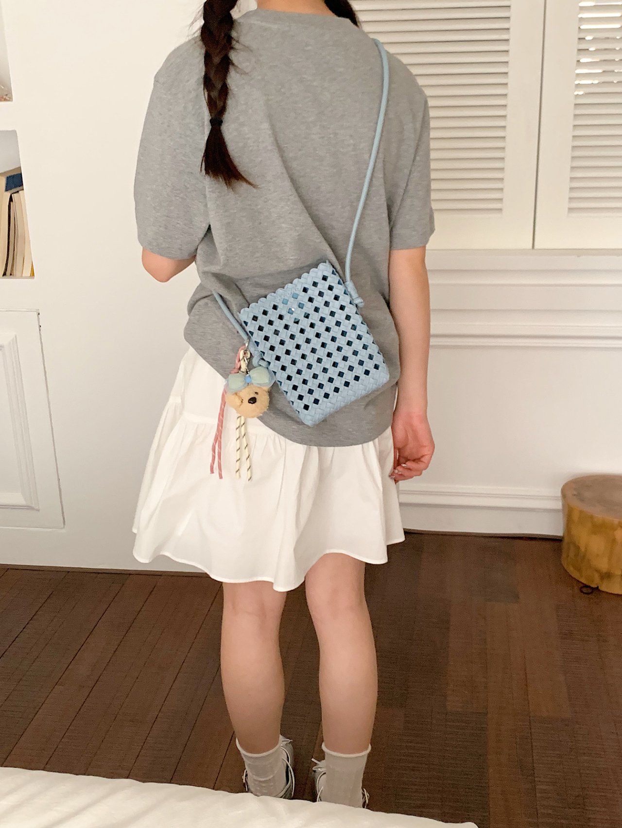 Stylish Blue Woven Crossbody Bag with Charm