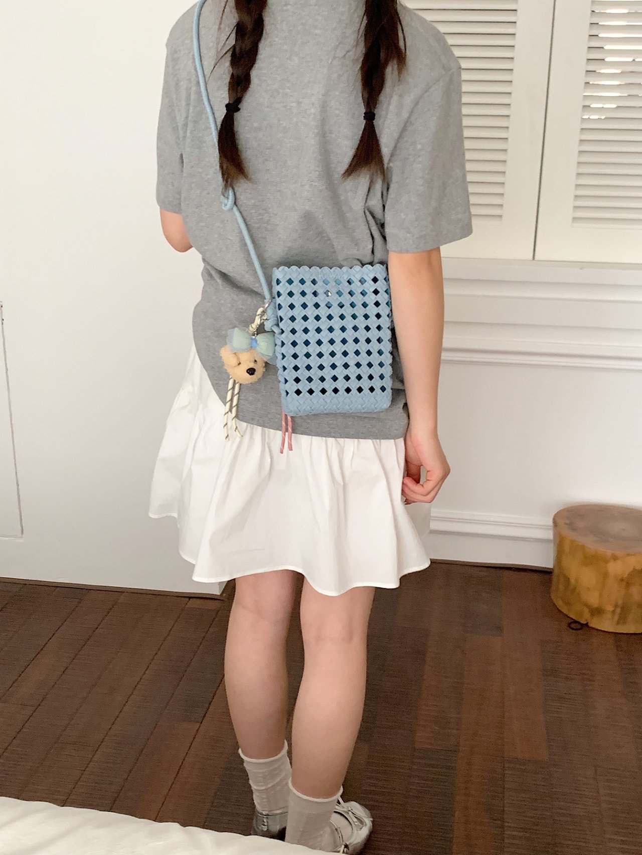 Stylish Blue Woven Crossbody Bag with Charm