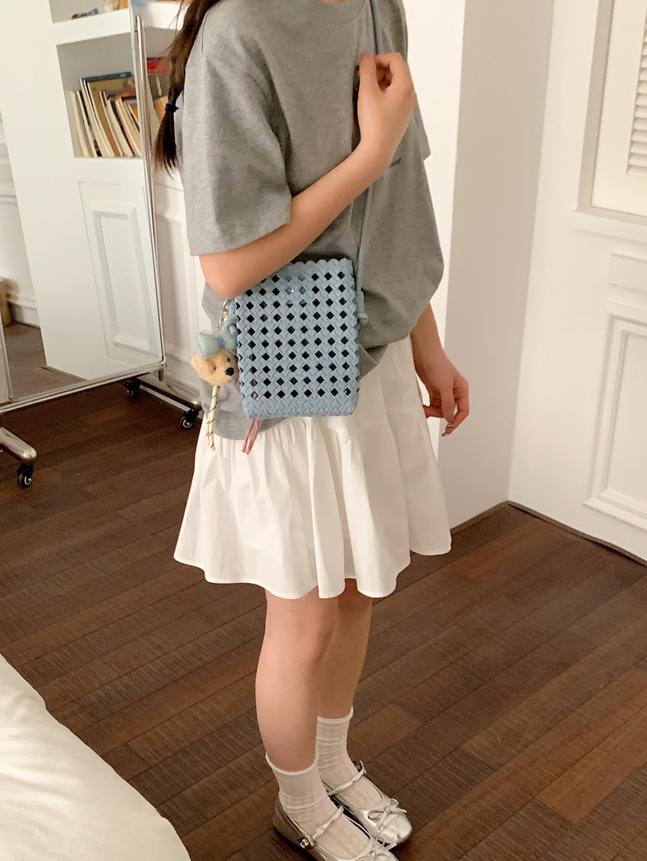 Stylish Blue Woven Crossbody Bag with Charm