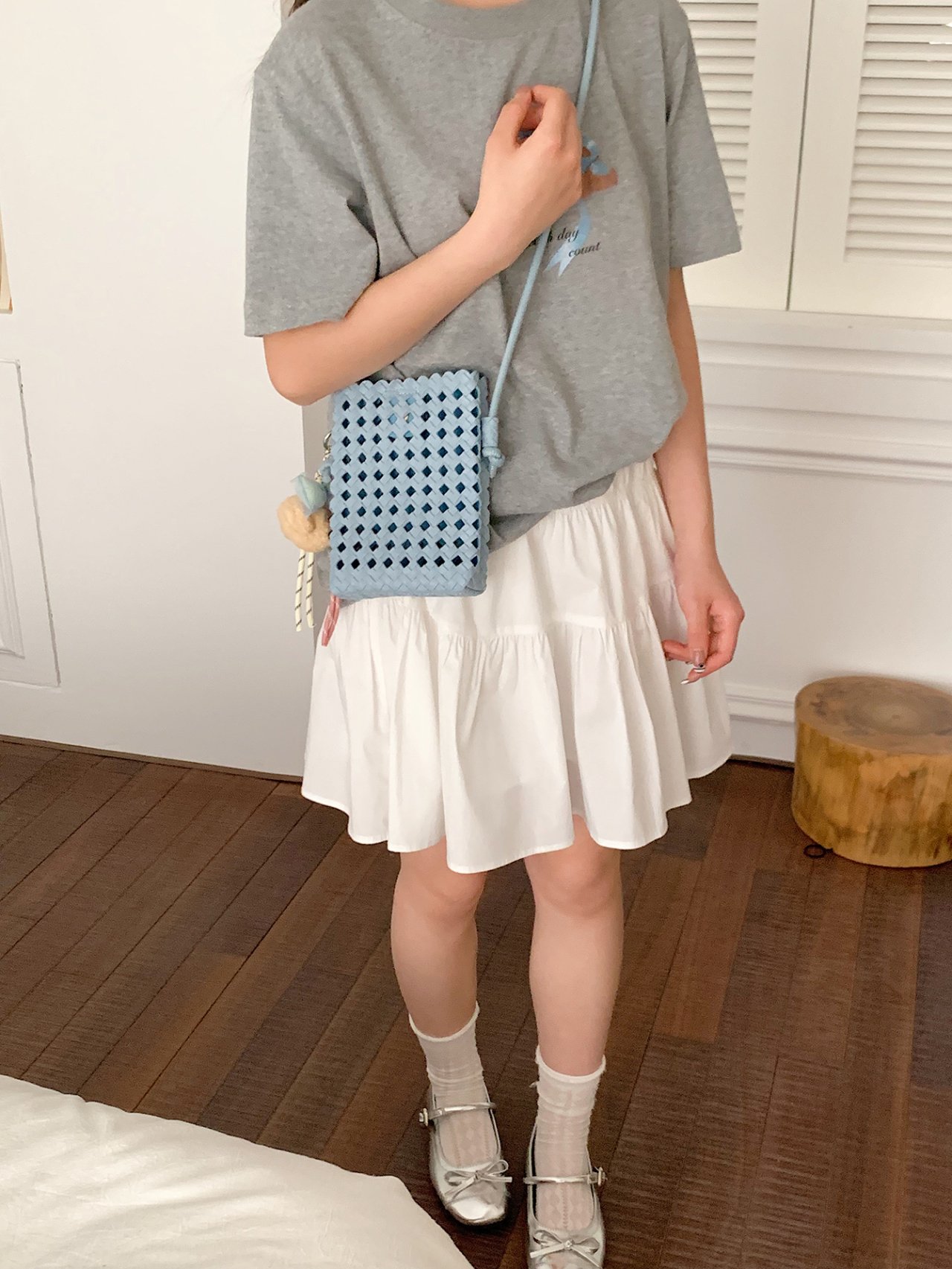 Stylish Blue Woven Crossbody Bag with Charm