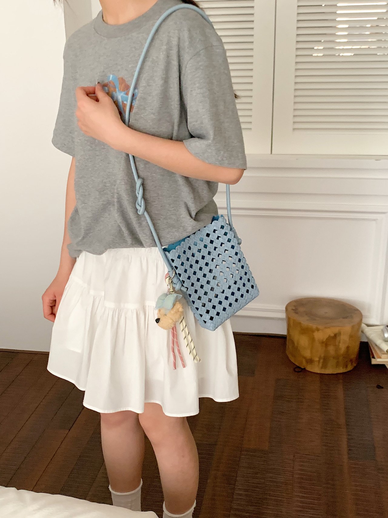 Stylish Blue Woven Crossbody Bag with Charm
