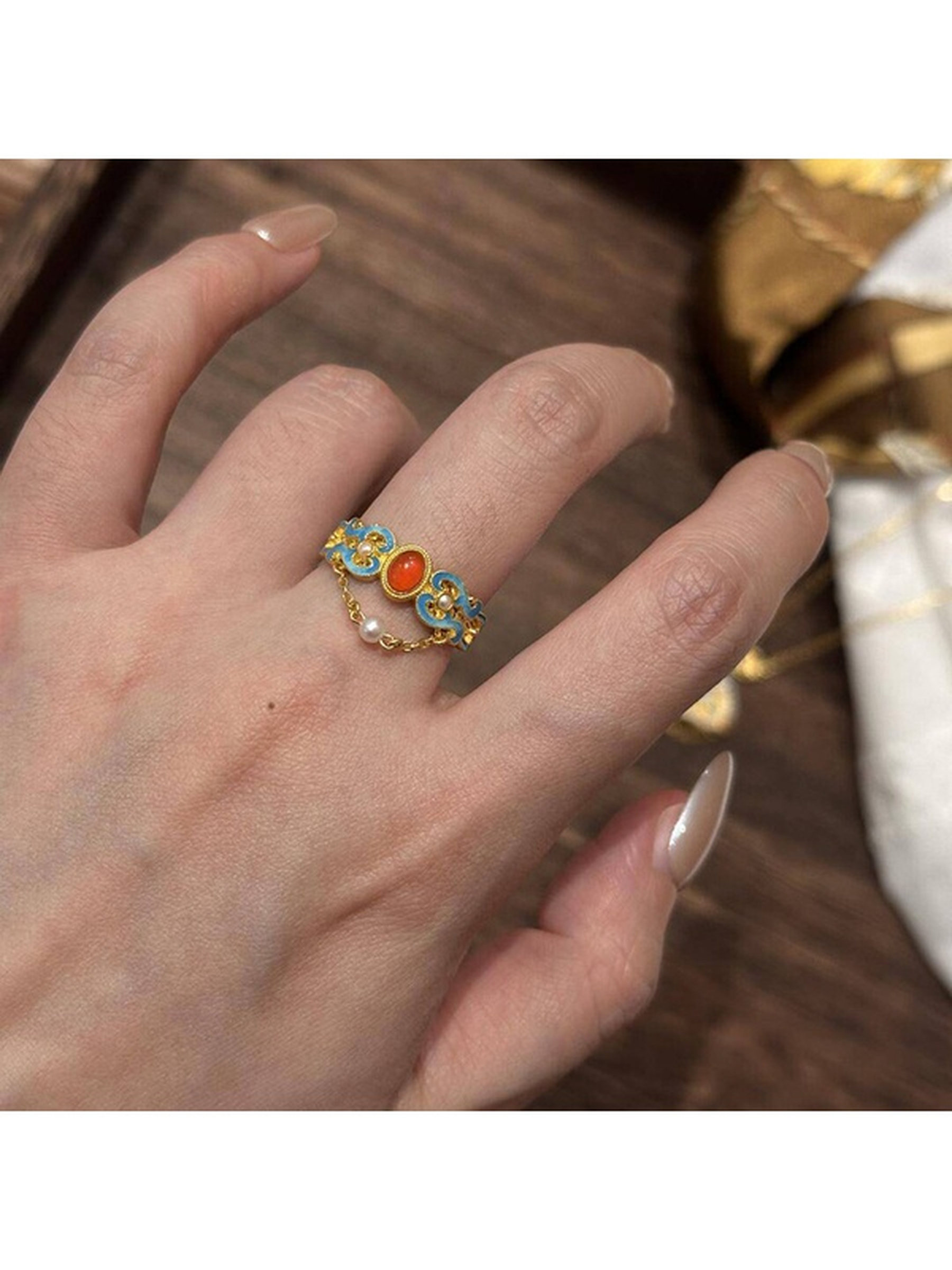 Golden Enamel and Carnelian Ring with Pearl Chain