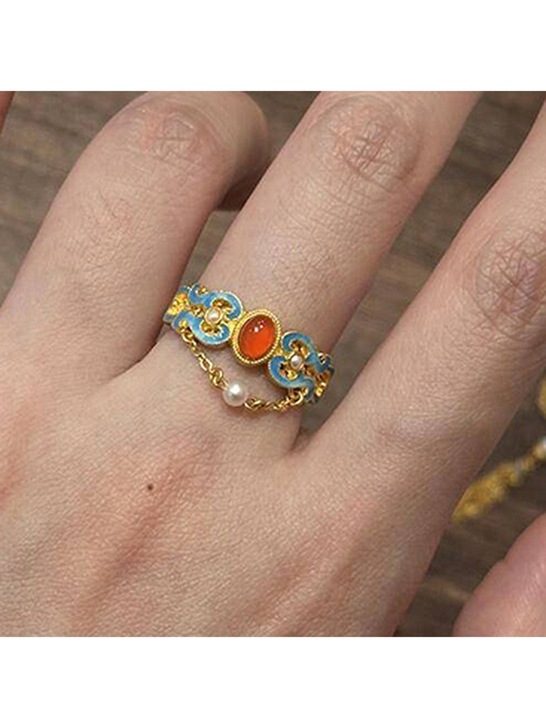 Golden Enamel and Carnelian Ring with Pearl Chain