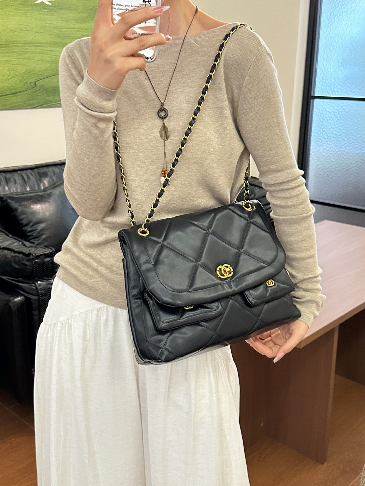 Black Quilted Shoulder Bag with Gold Chain Strap