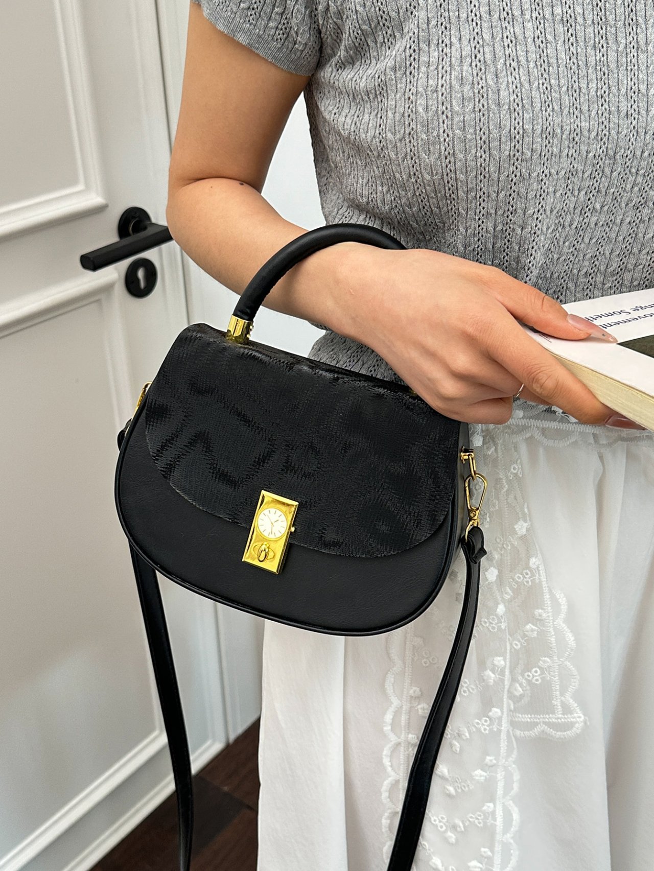 Black Crossbody Bag with Top Handle and Clock Detail