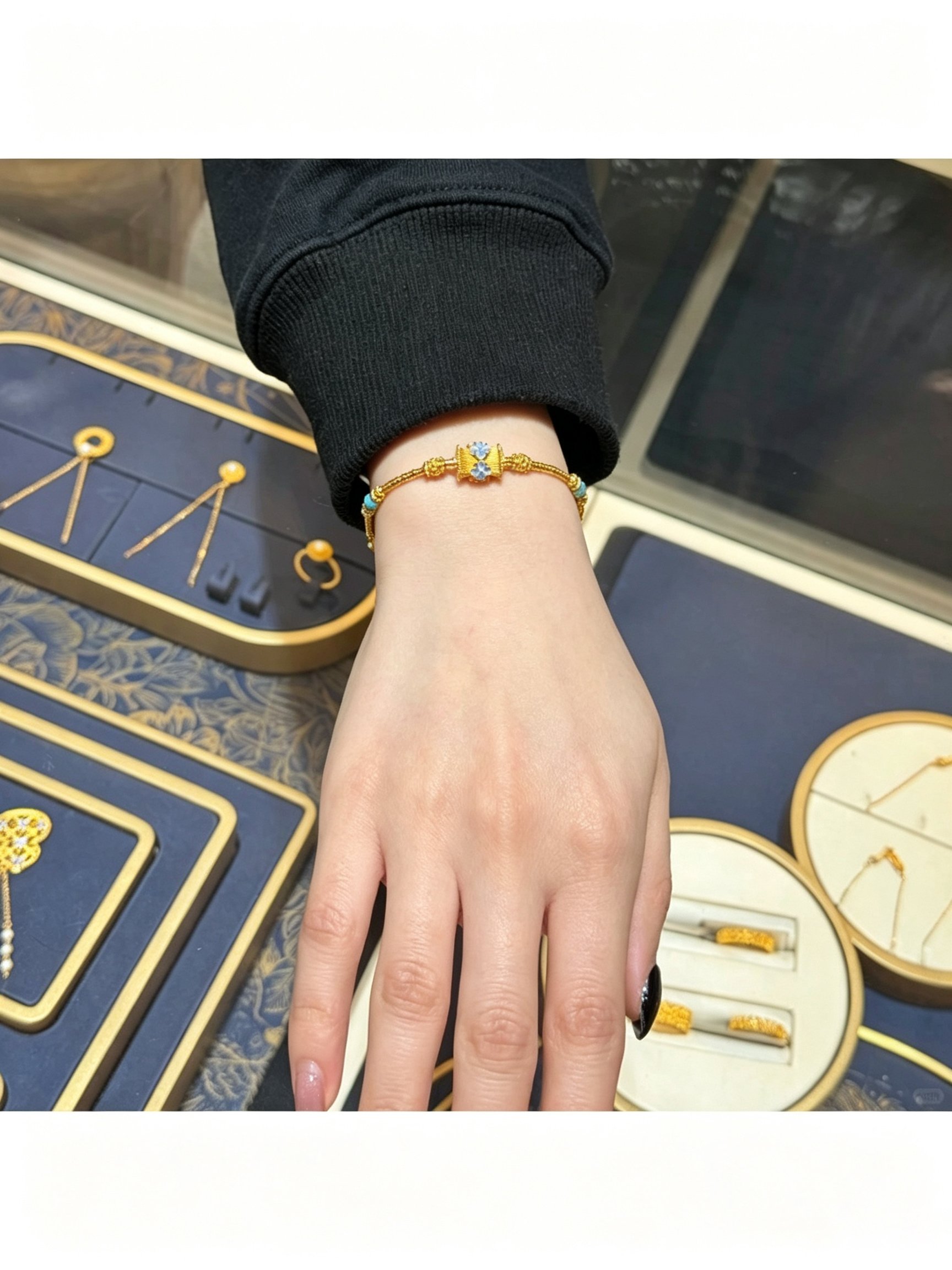 Golden Charm Bracelet with Blue Enamel and Turquoise Accent