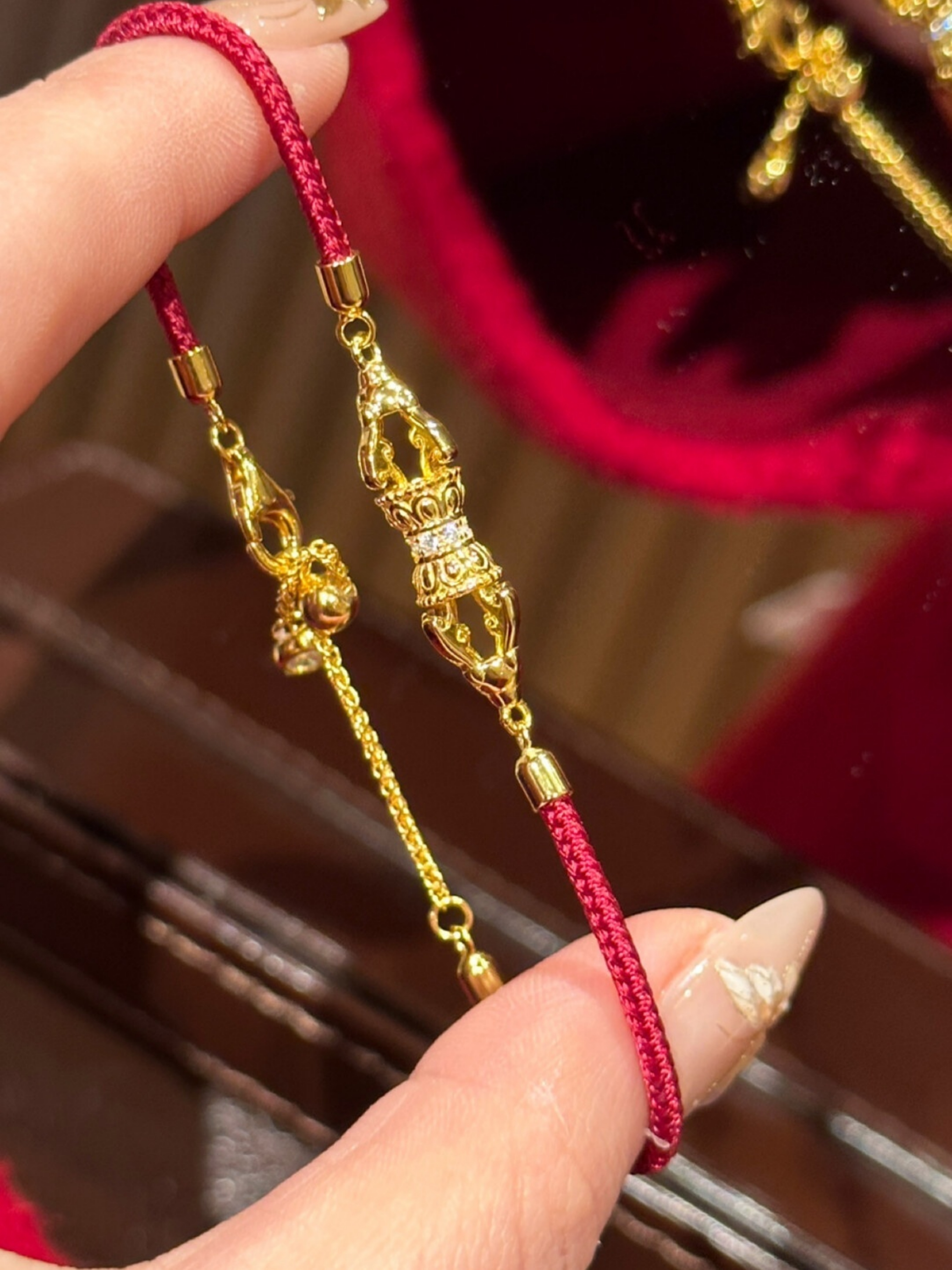 Gold Bracelet with Red Rope