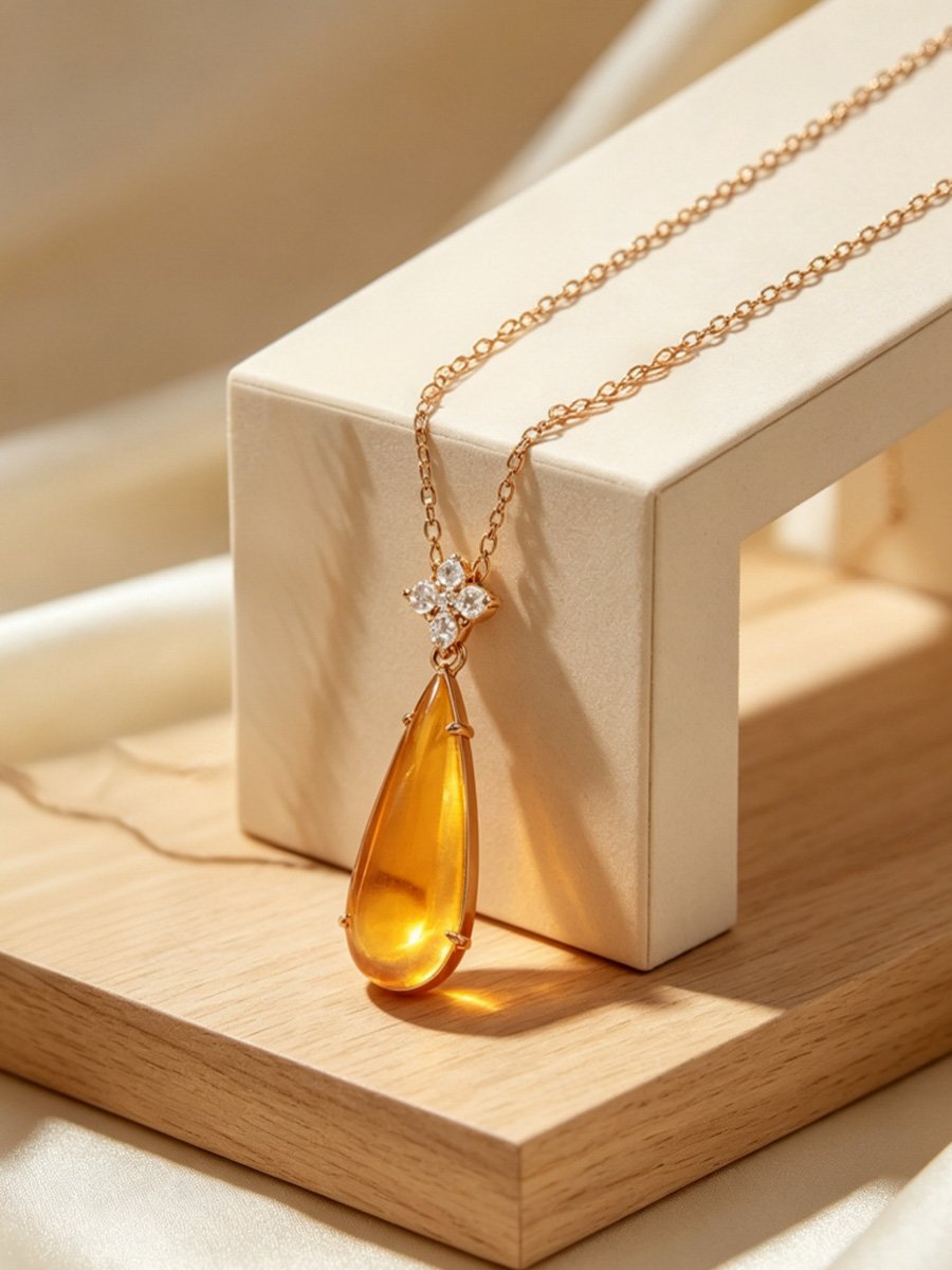 Golden Teardrop Pendant Necklace with Clover
