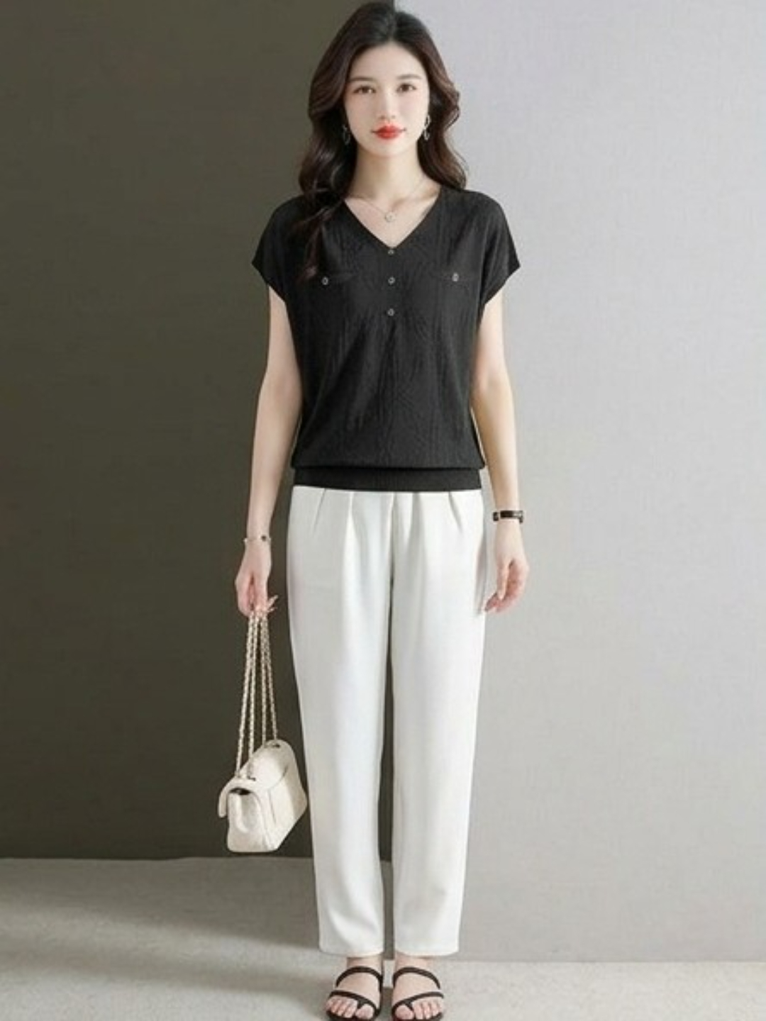 Black V-Neck Woven Top with Subtle Embellishments