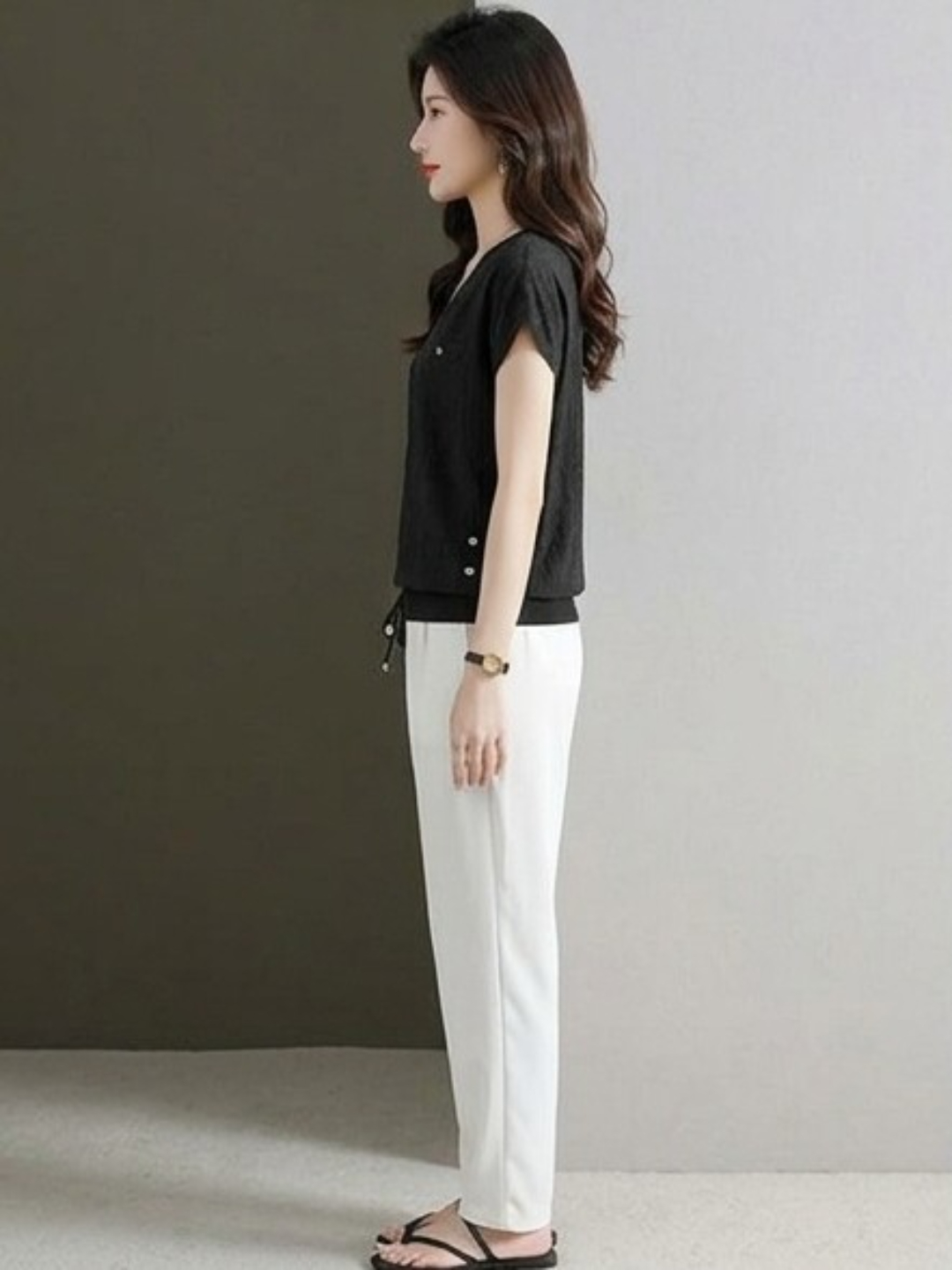 Black V-Neck Woven Top with Subtle Embellishments