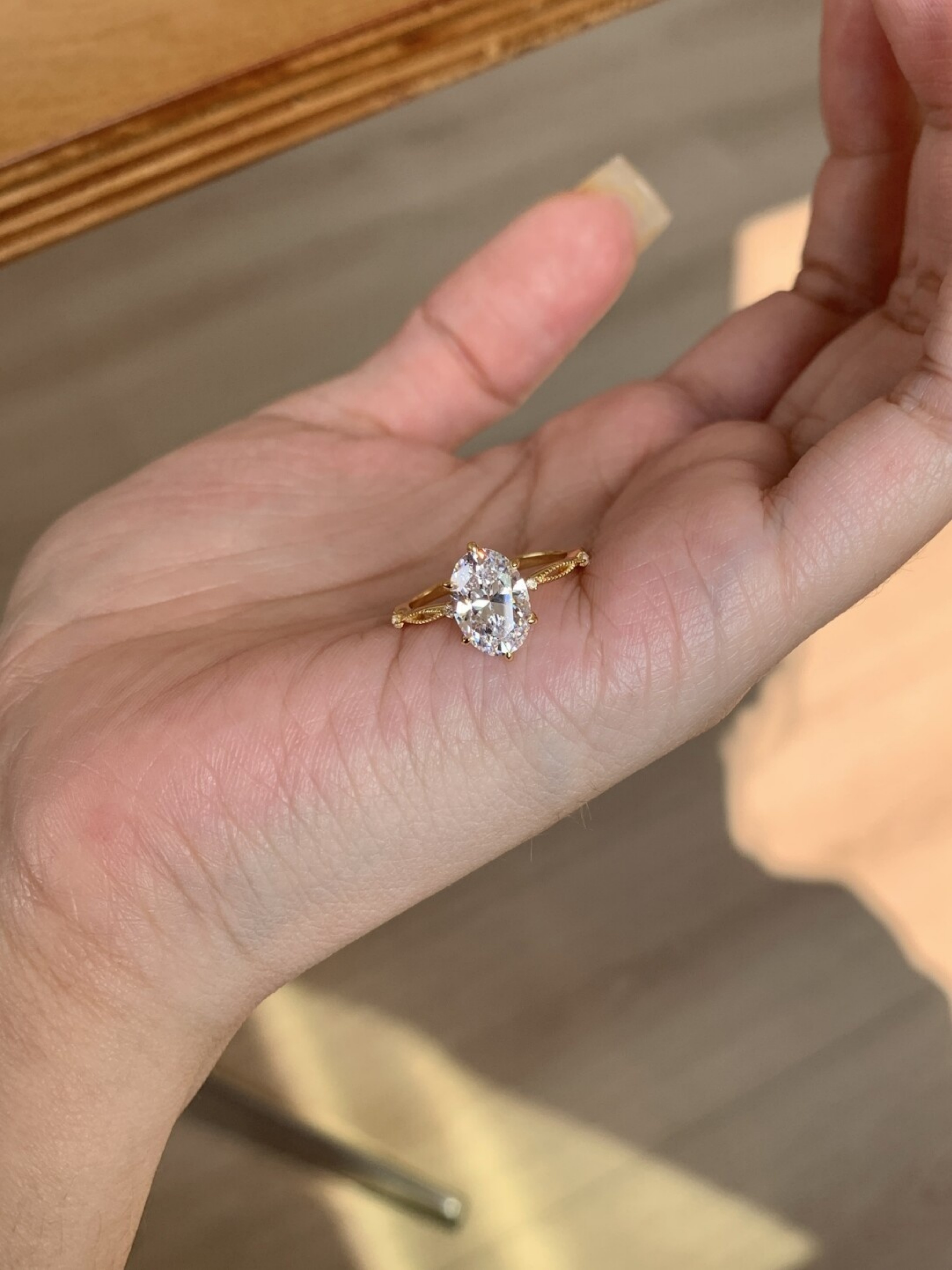 Gold Ring with Oval-Cut Zircon Stones