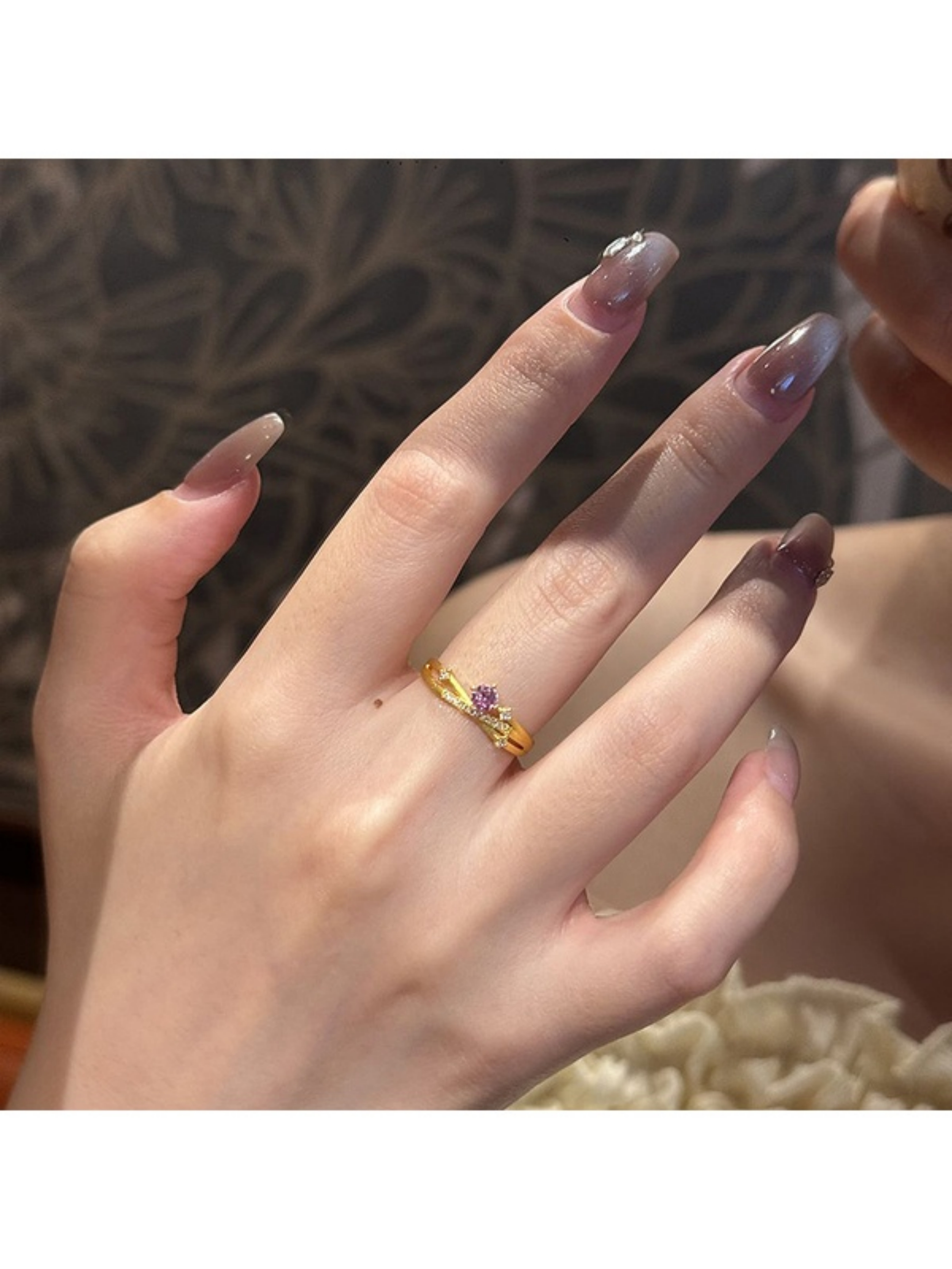 Gold Ring with Purple Zircon Crown Design