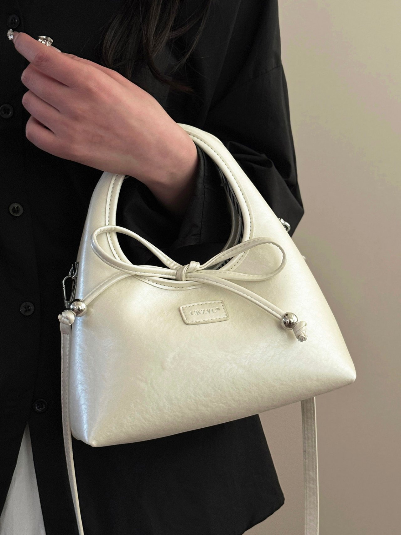 Off-White Crossbody Bag with Bow Tie