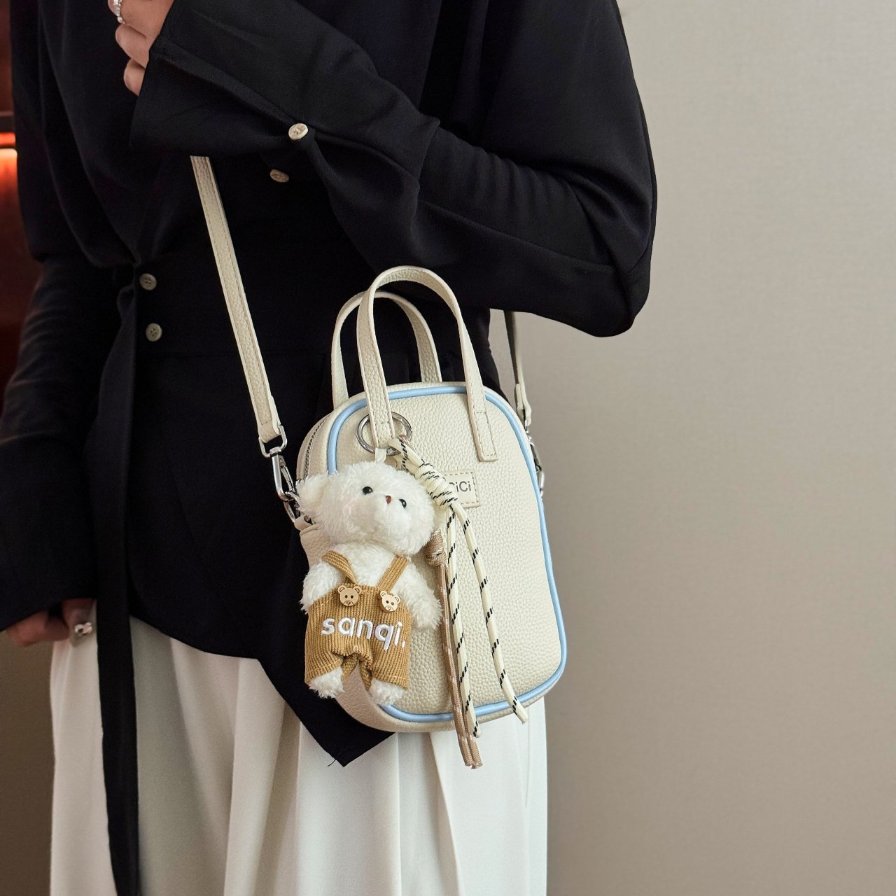 Off-White Solid Crossbody Bag with Charm