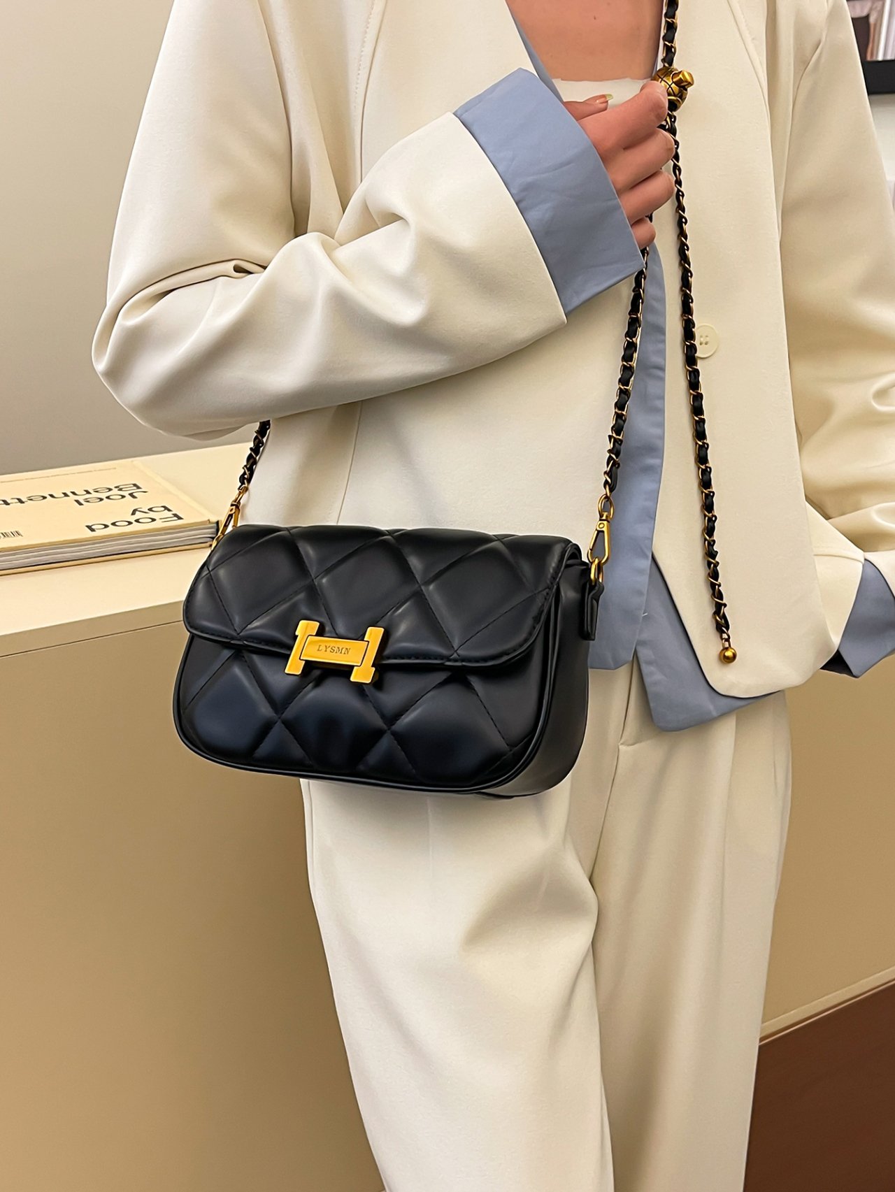 Black Quilted Crossbody Bag with Gold Chain Strap