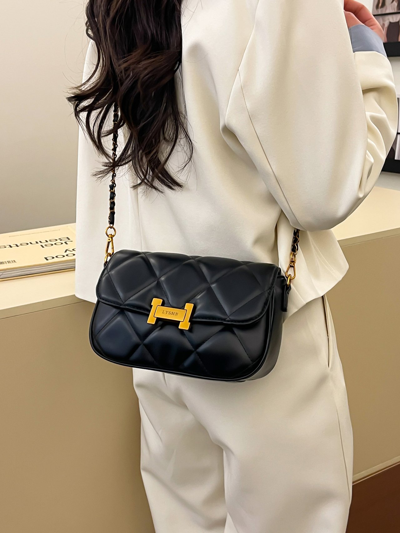 Black Quilted Crossbody Bag with Gold Chain Strap