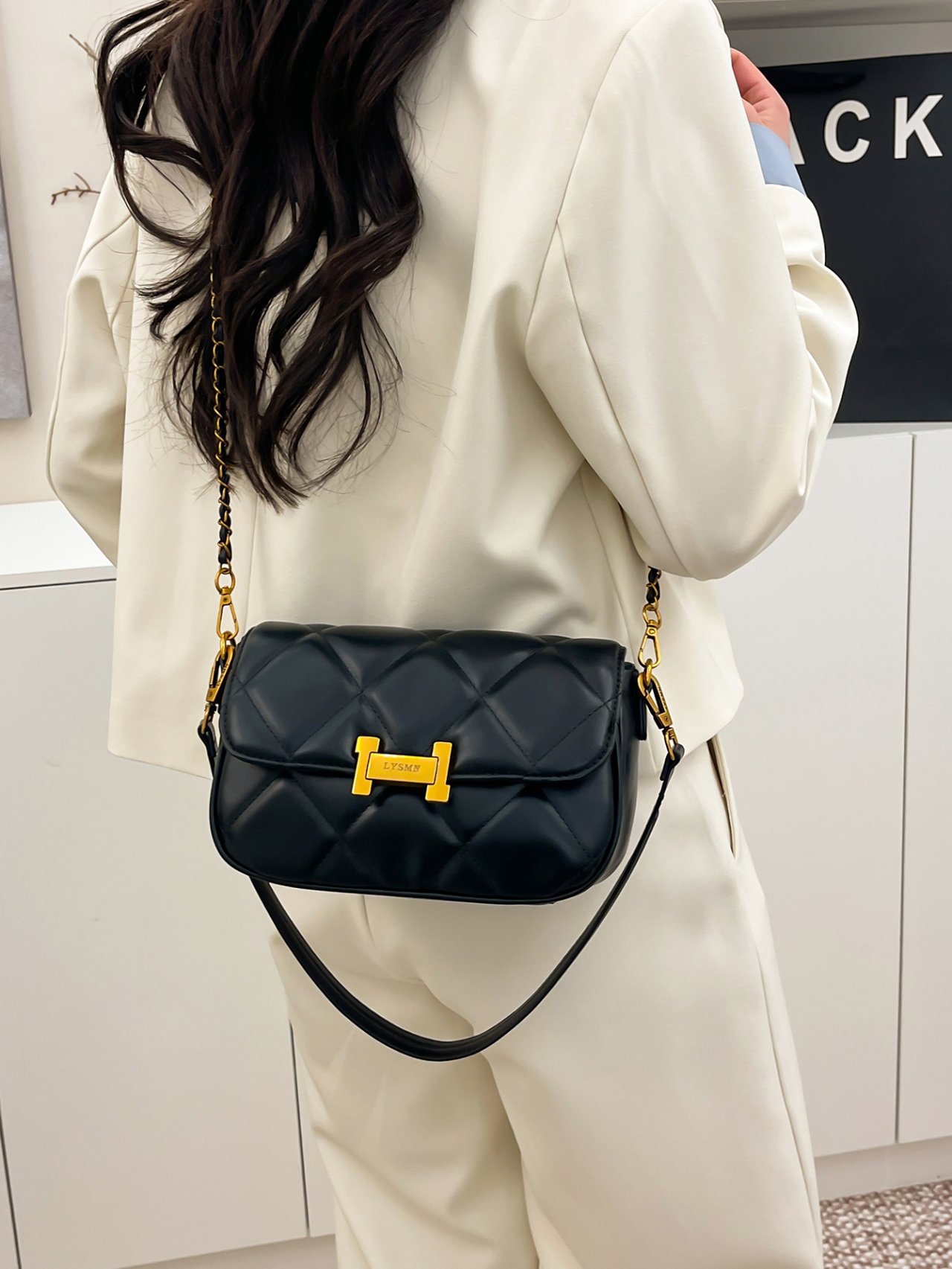 Black Quilted Crossbody Bag with Gold Chain Strap