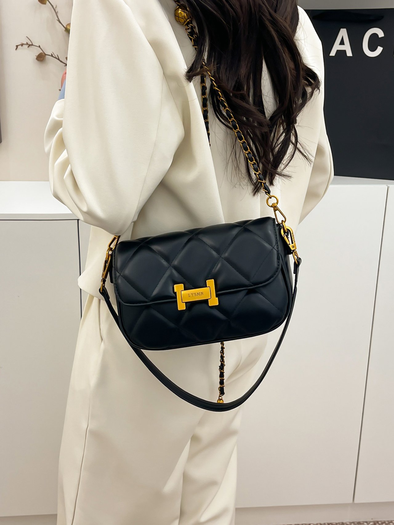 Black Quilted Crossbody Bag with Gold Chain Strap