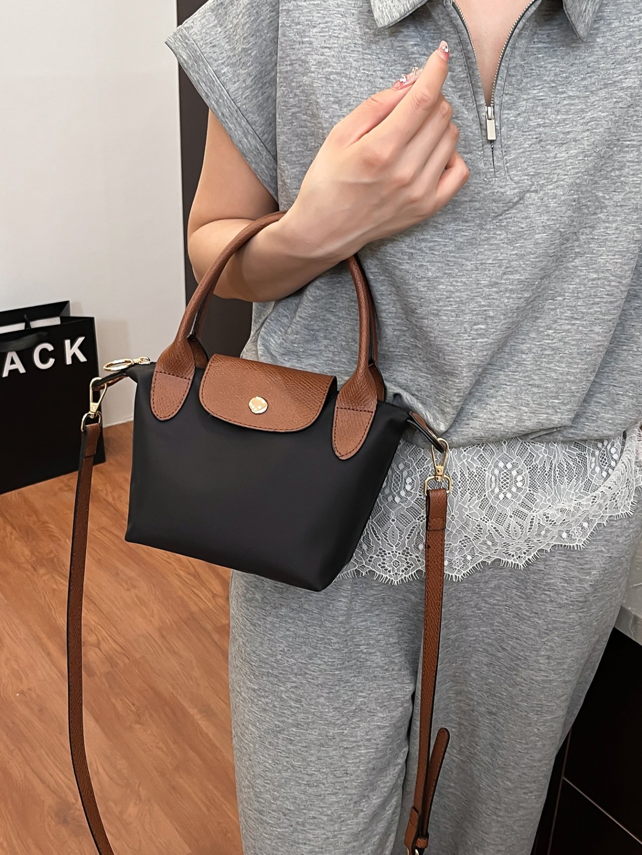 Black Crossbody Bag with Brown Accents